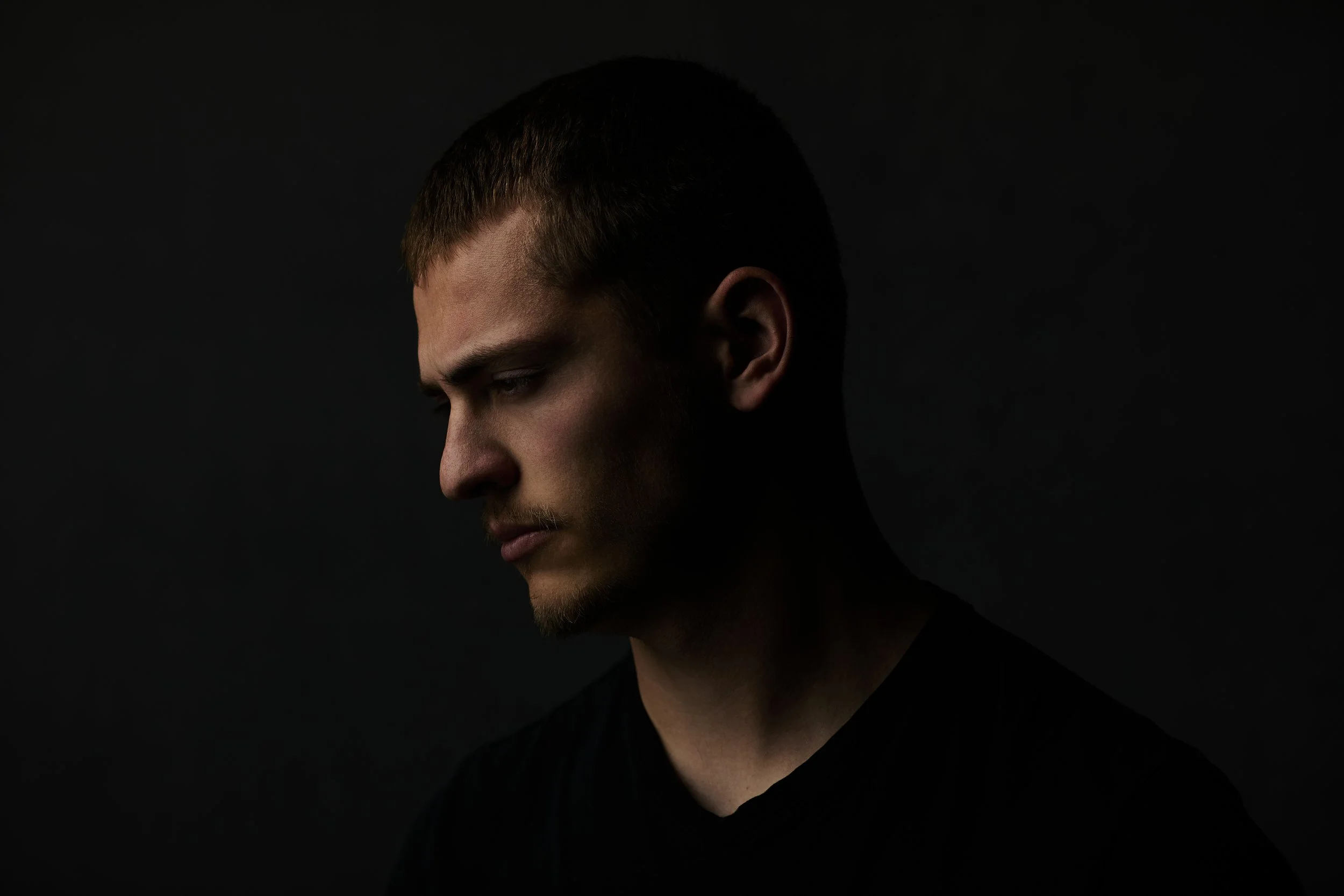 Modern studio portrait with soft lighting and natural skin texture photographed in Fort Wayne, IN.