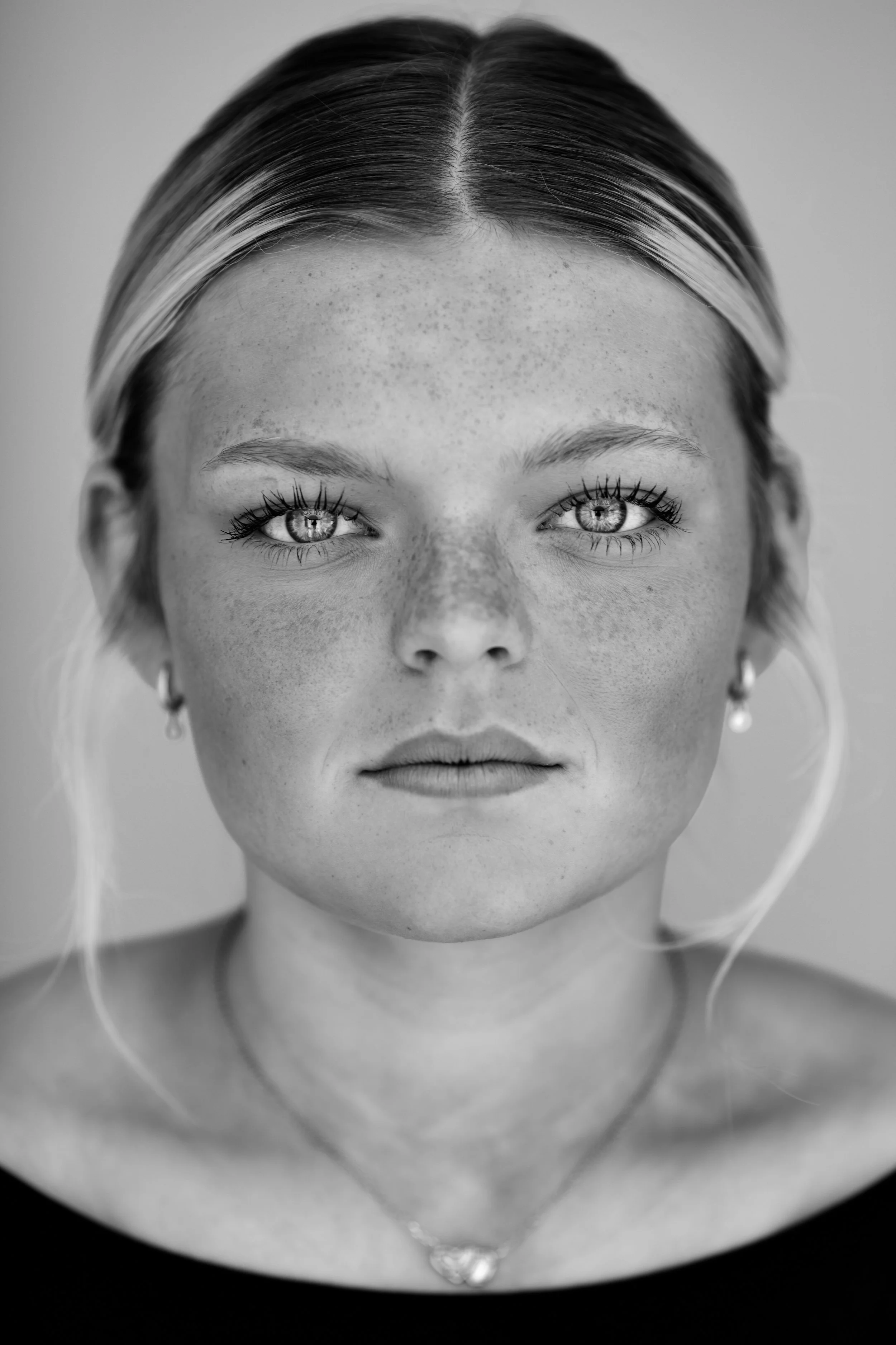 Modern studio portrait with soft lighting and natural skin texture photographed in Fort Wayne, IN.