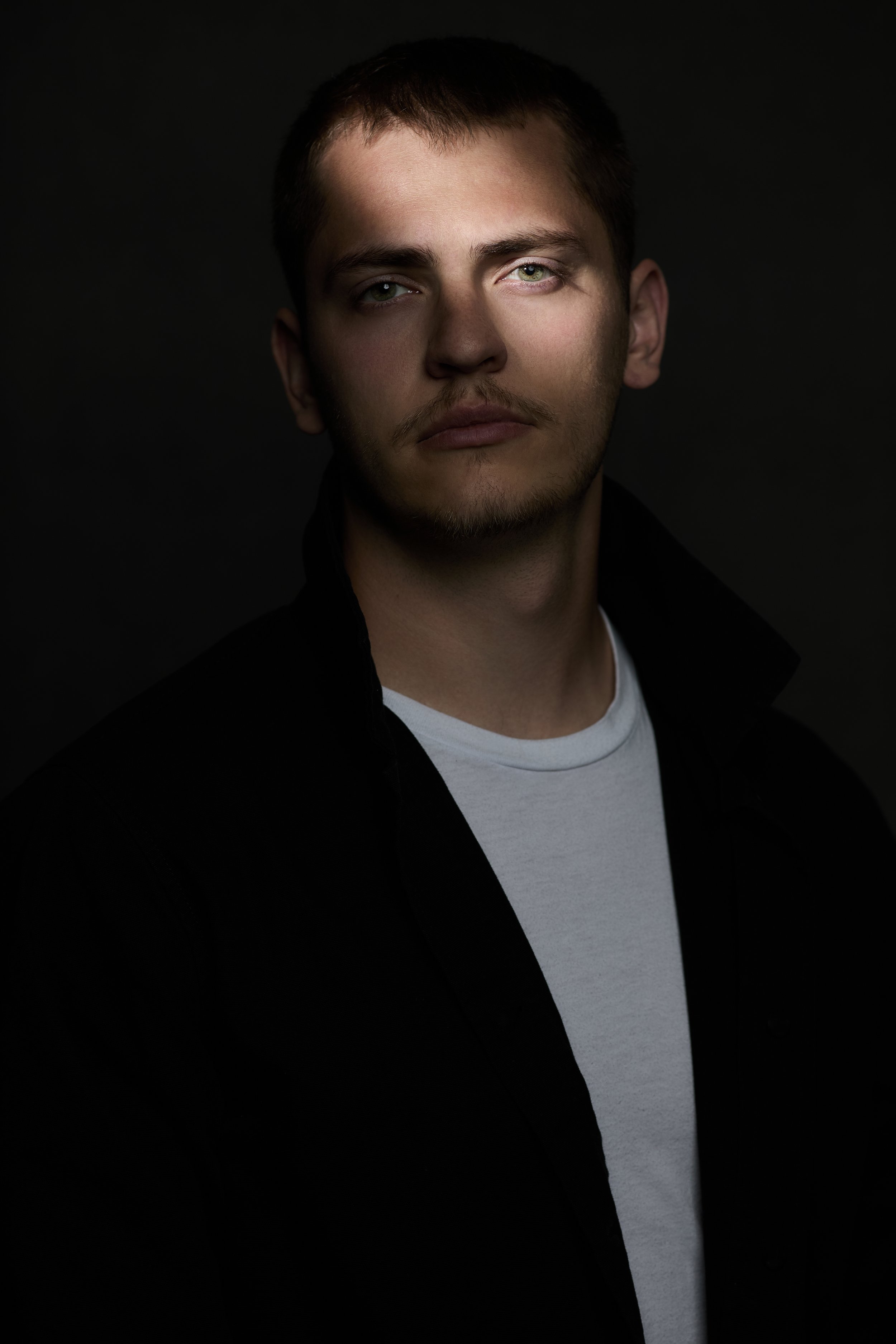 Modern studio portrait with soft lighting and natural skin texture photographed in Fort Wayne, IN.