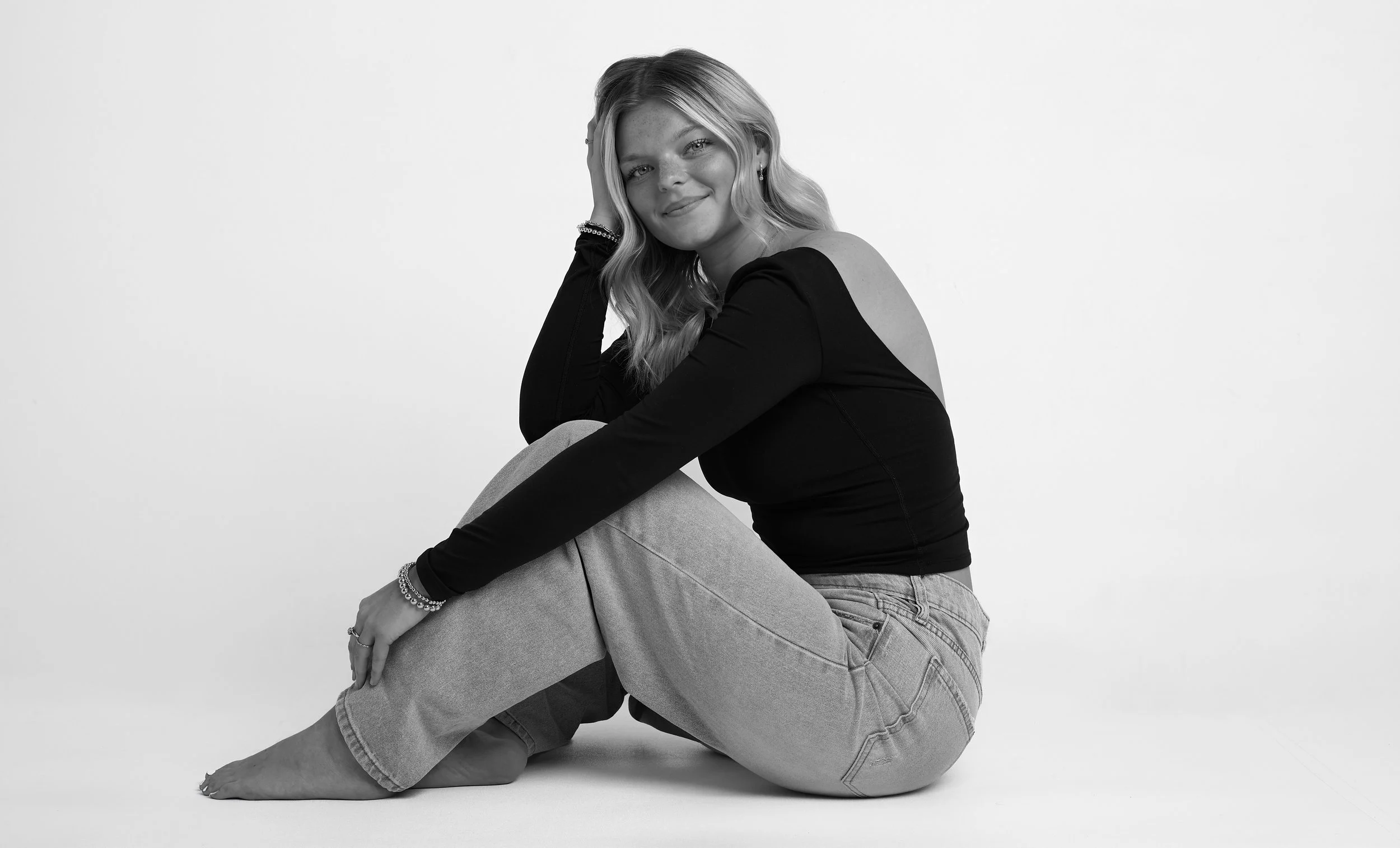 Modern studio portrait with soft lighting and natural skin texture photographed in Fort Wayne, IN.
