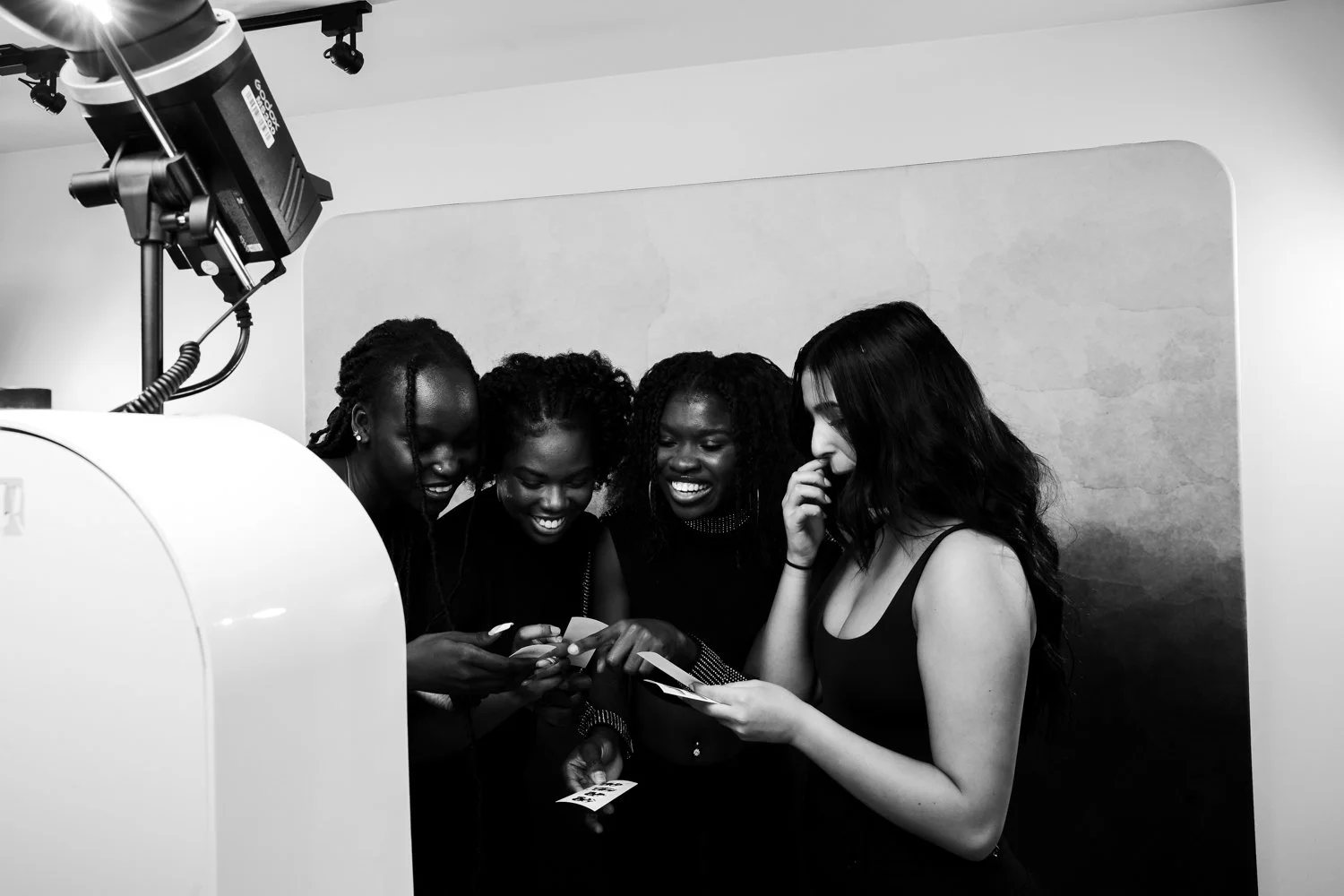 Black and white glam photo booth portraits for luxury event entertainment in New Orleans.