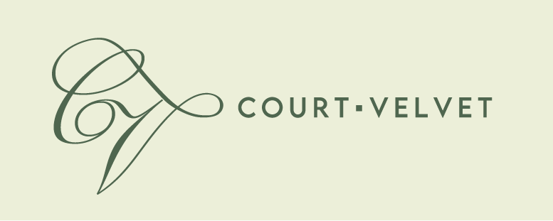 Logo for Court Velvet featuring a stylized cursive letter 'C' and the words 'Court Velvet' in uppercase letters.
