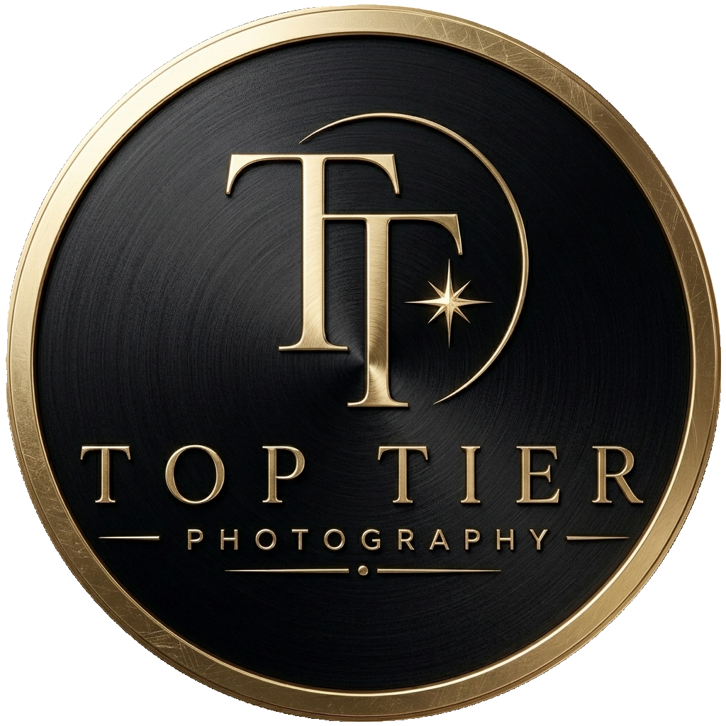 A circular logo with a black background and gold border. In the center are large gold initials 'T' and 'F' intertwined, with a star symbol next to them. Below are the words 'TOP TIER' in gold uppercase letters, and beneath that is the word 'PHOTOGRAPHY' in smaller gold uppercase letters.