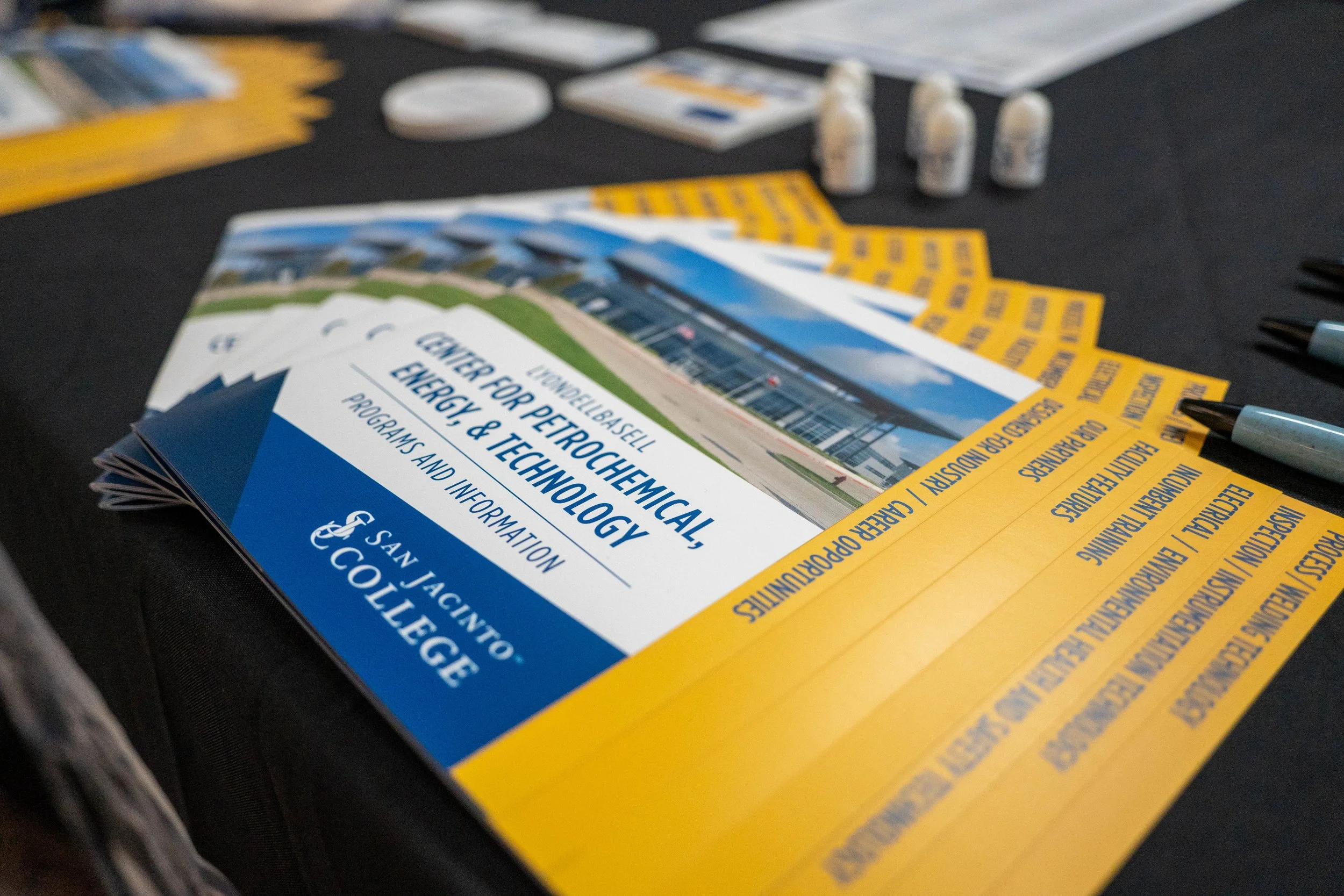 Brochures for the Center for Petroleum, Energy & Technology at San Jacinto College with a building image and information on programs and initiatives.