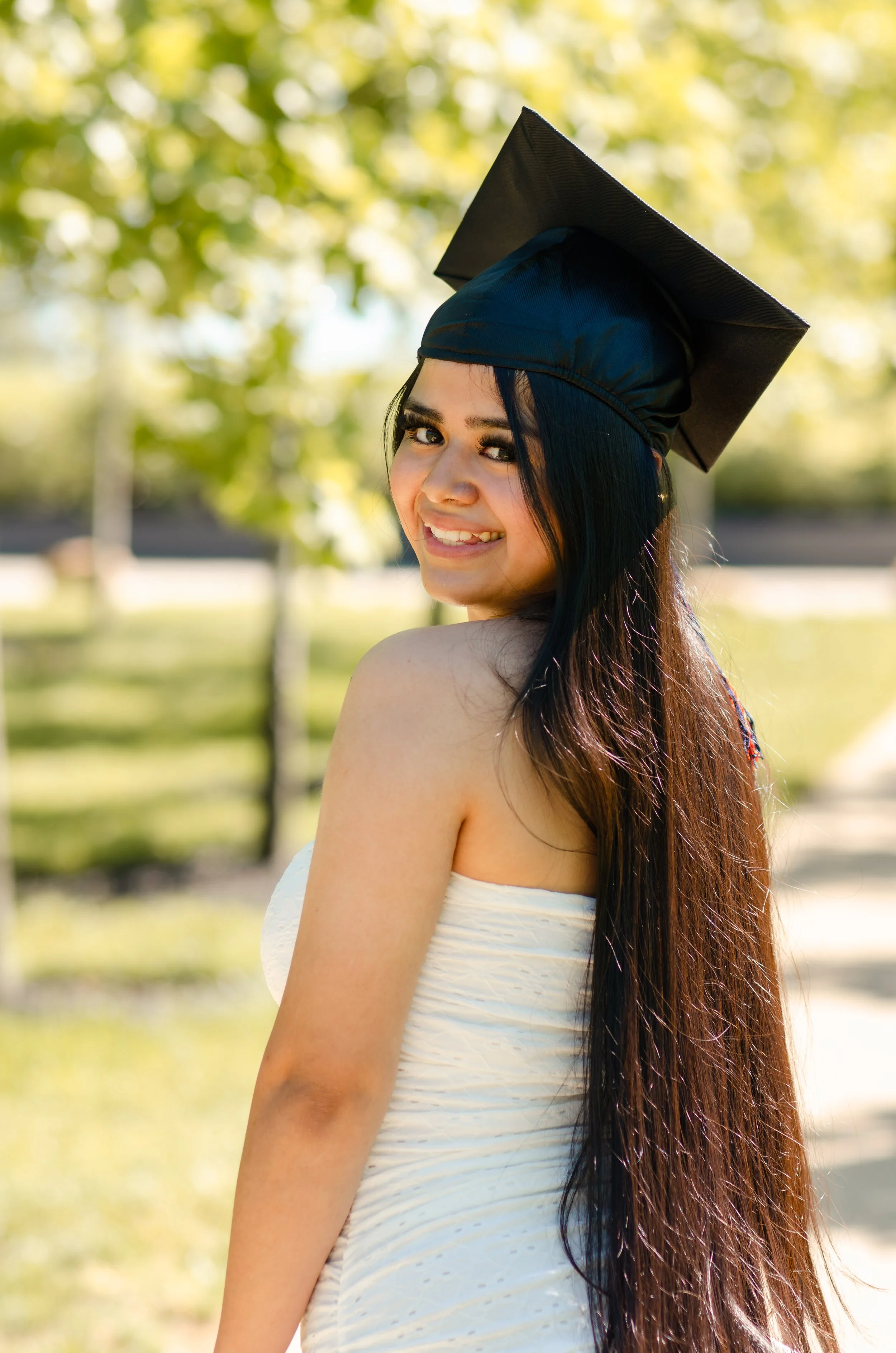Soft and airy graduation photos in Maryville park with genuine, unposed feeling