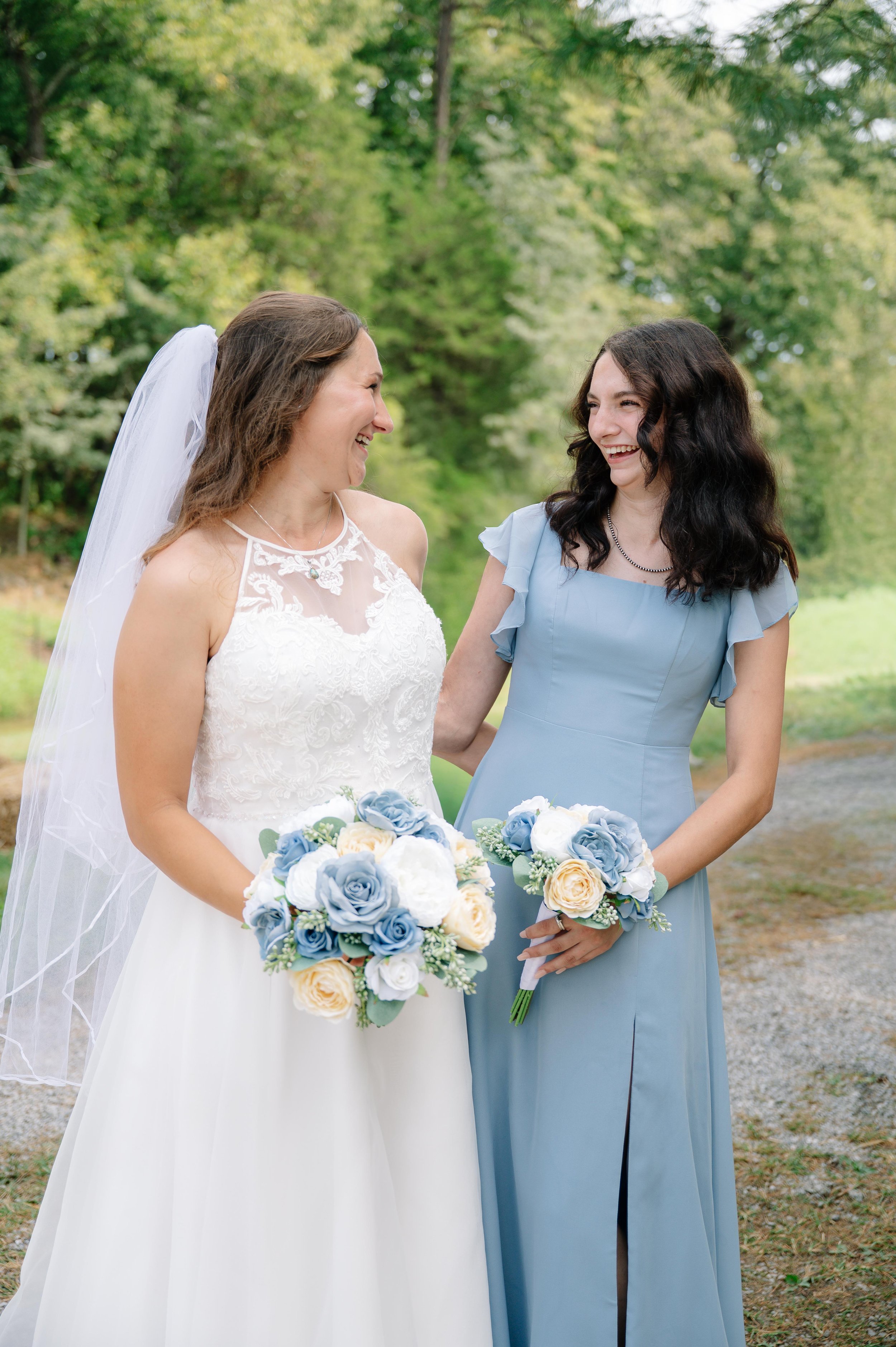 Candid moment between bride and sister captured by a wedding photographer