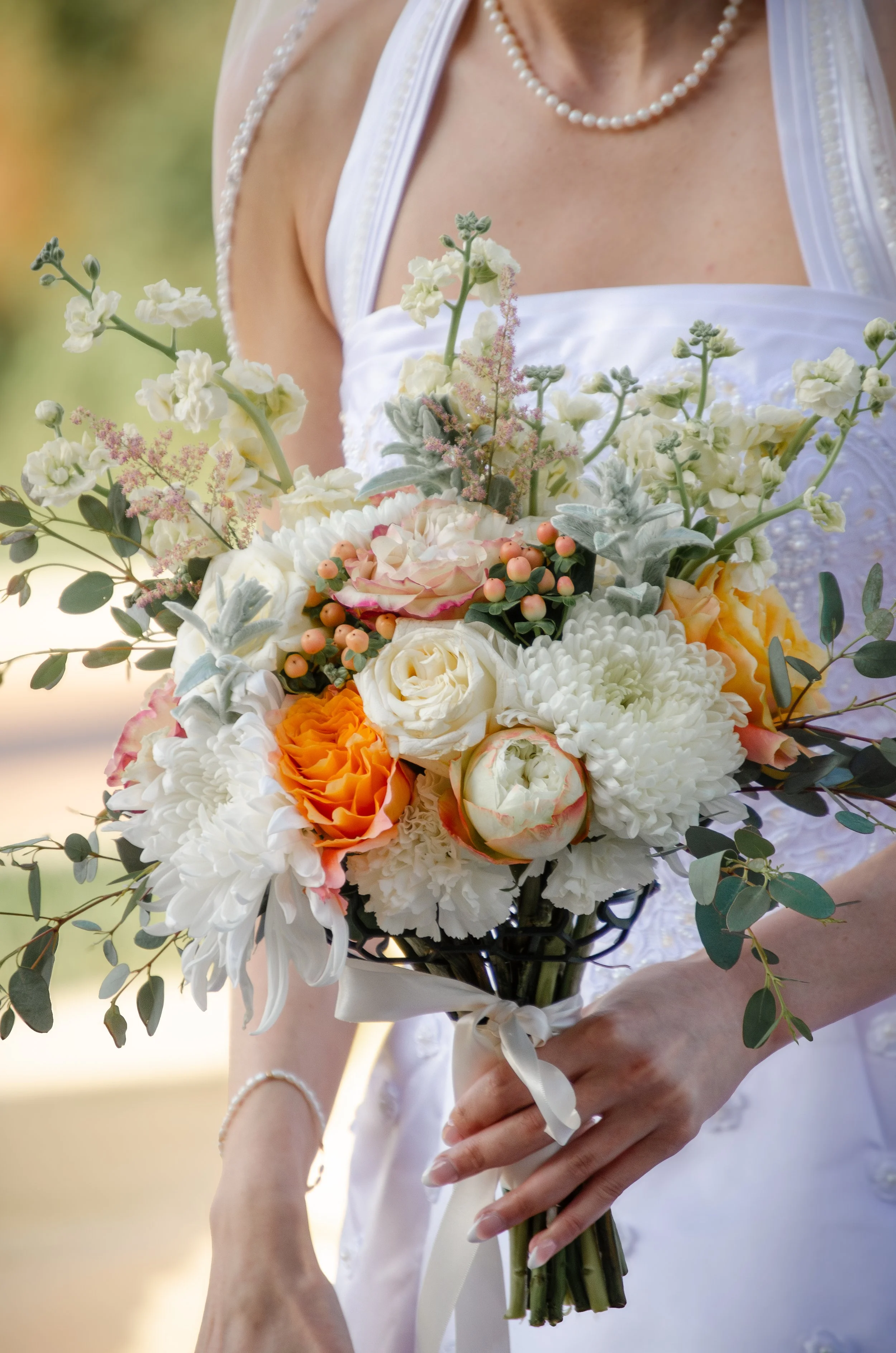 Bride holding a colorful bouquet during an East Tennessee wedding