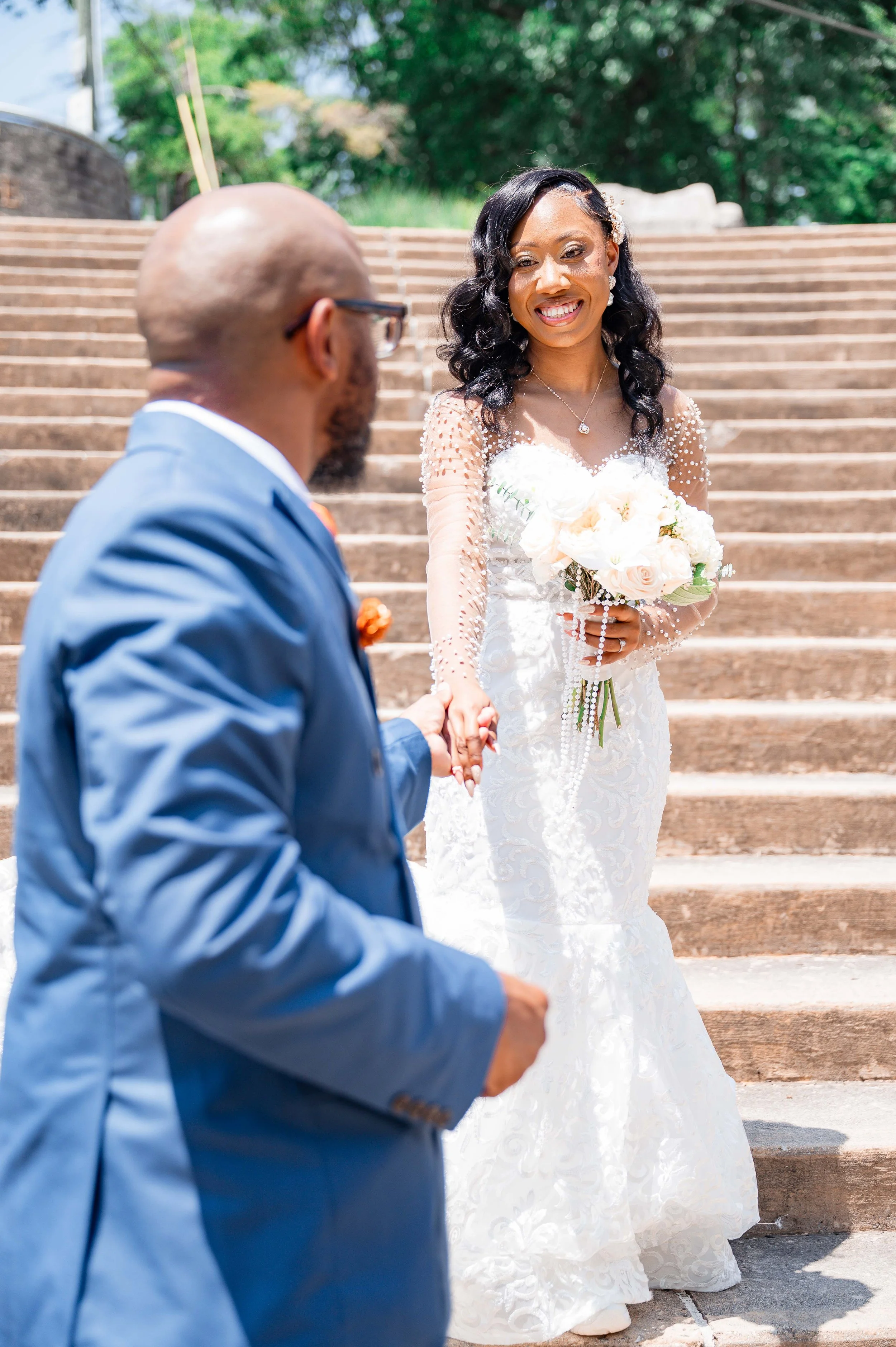 Bride and groom walking together after their wedding ceremony in Maryville Tennessee captured by a wedding photographer