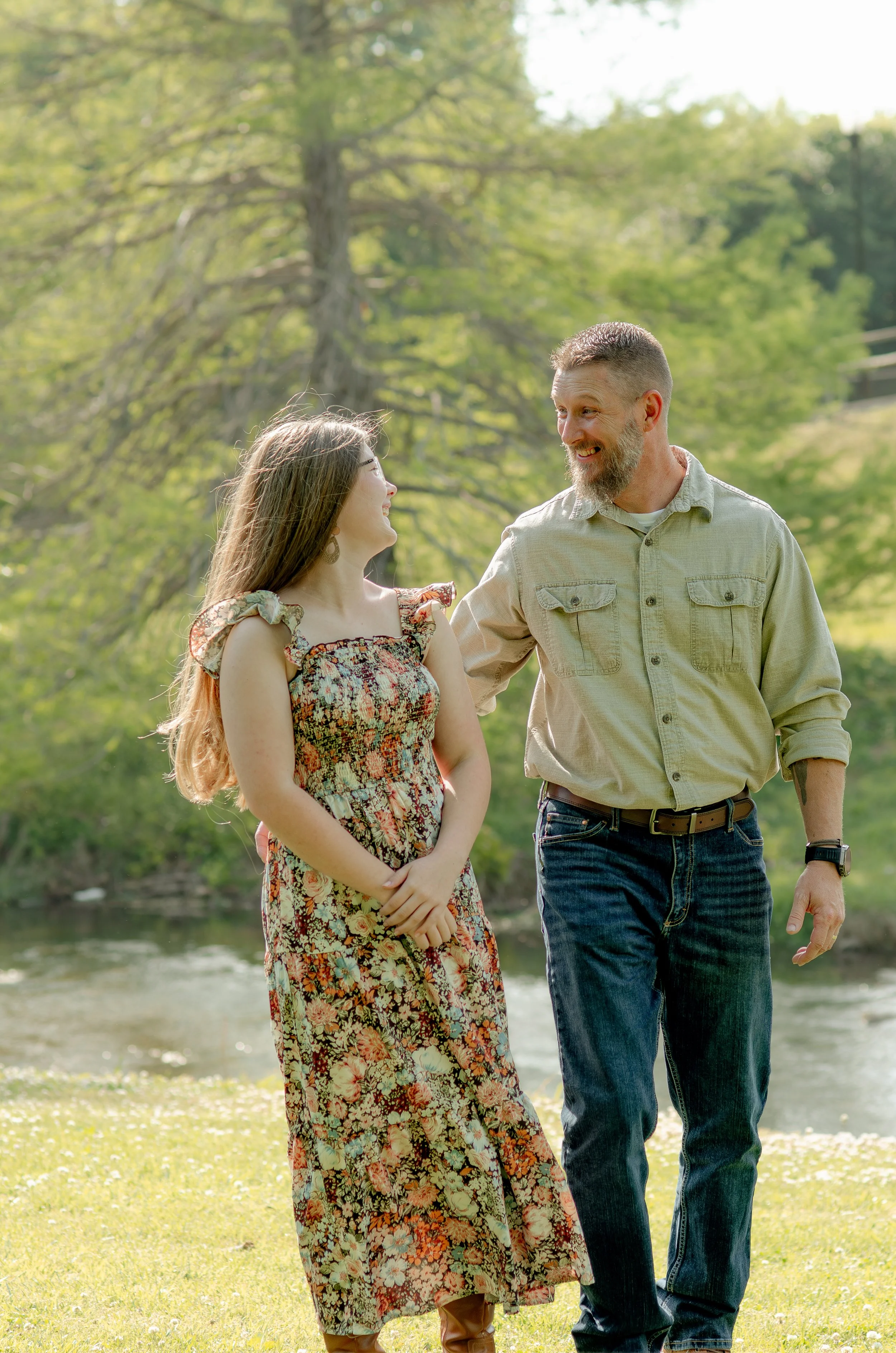 Family session in Knoxville park with soft, airy light and natural connection