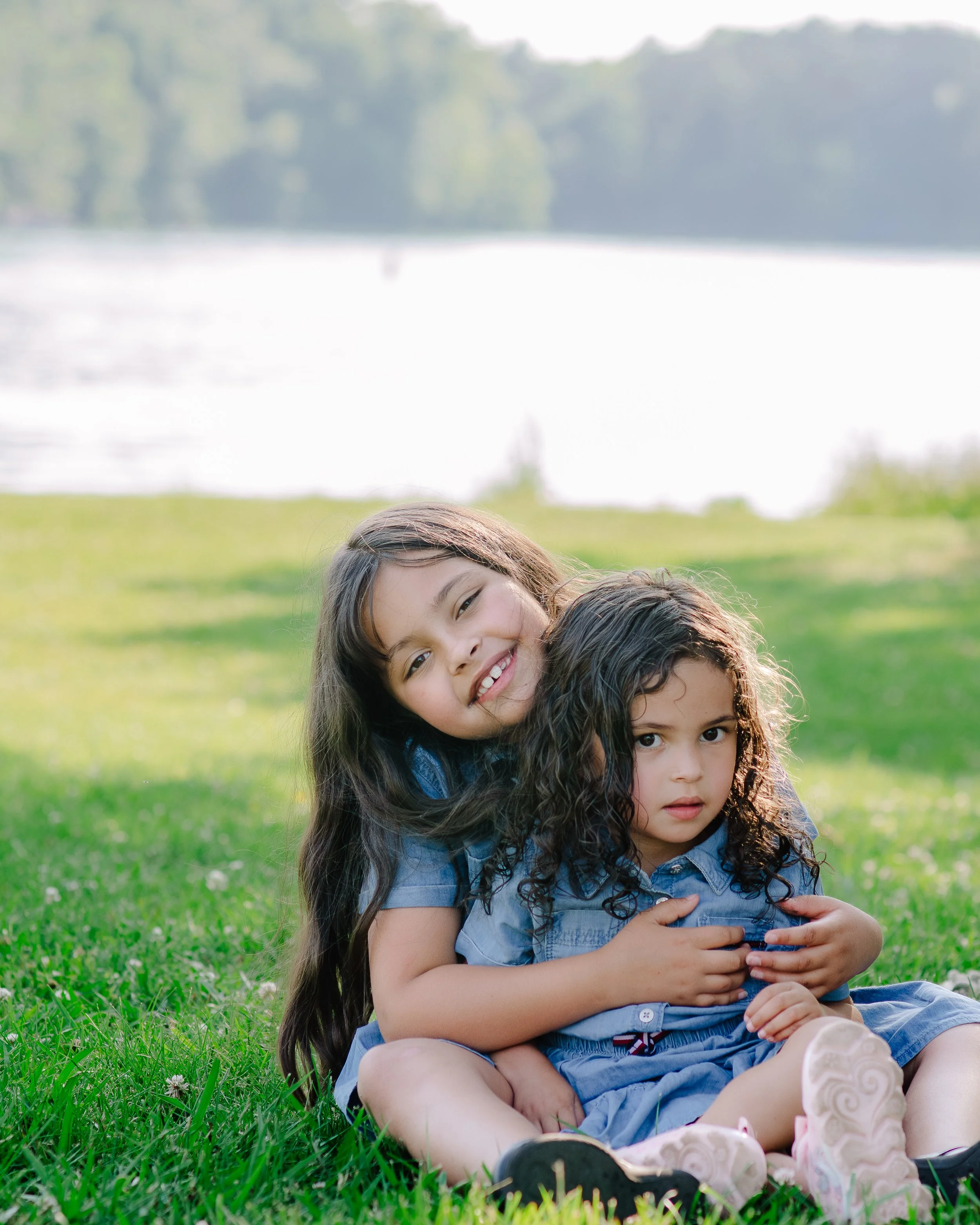 Maryville and Knoxville family photographer capturing timeless outdoor portraits of little sisters 