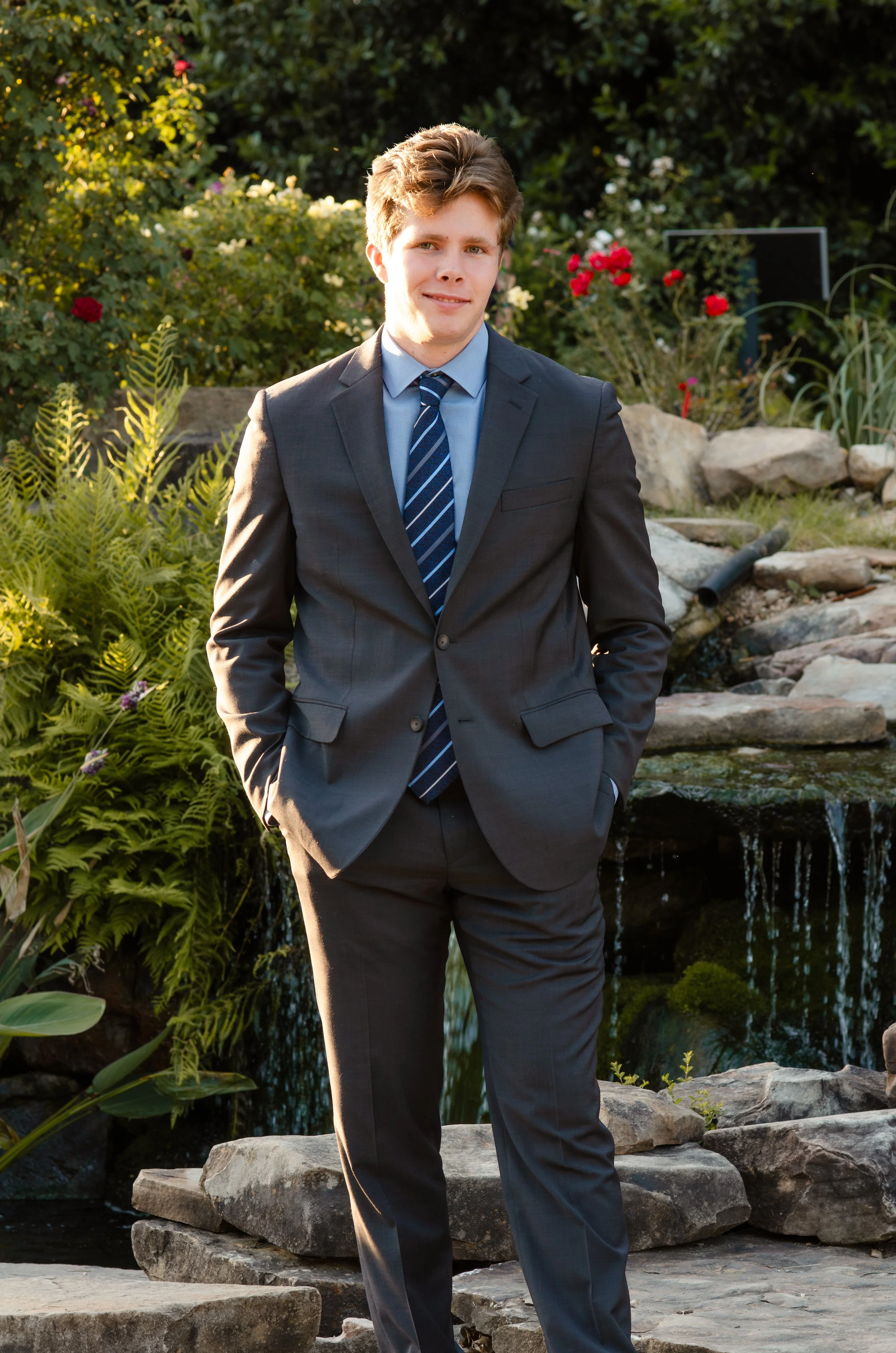 College senior celebrating a major milestone with professional portraits.