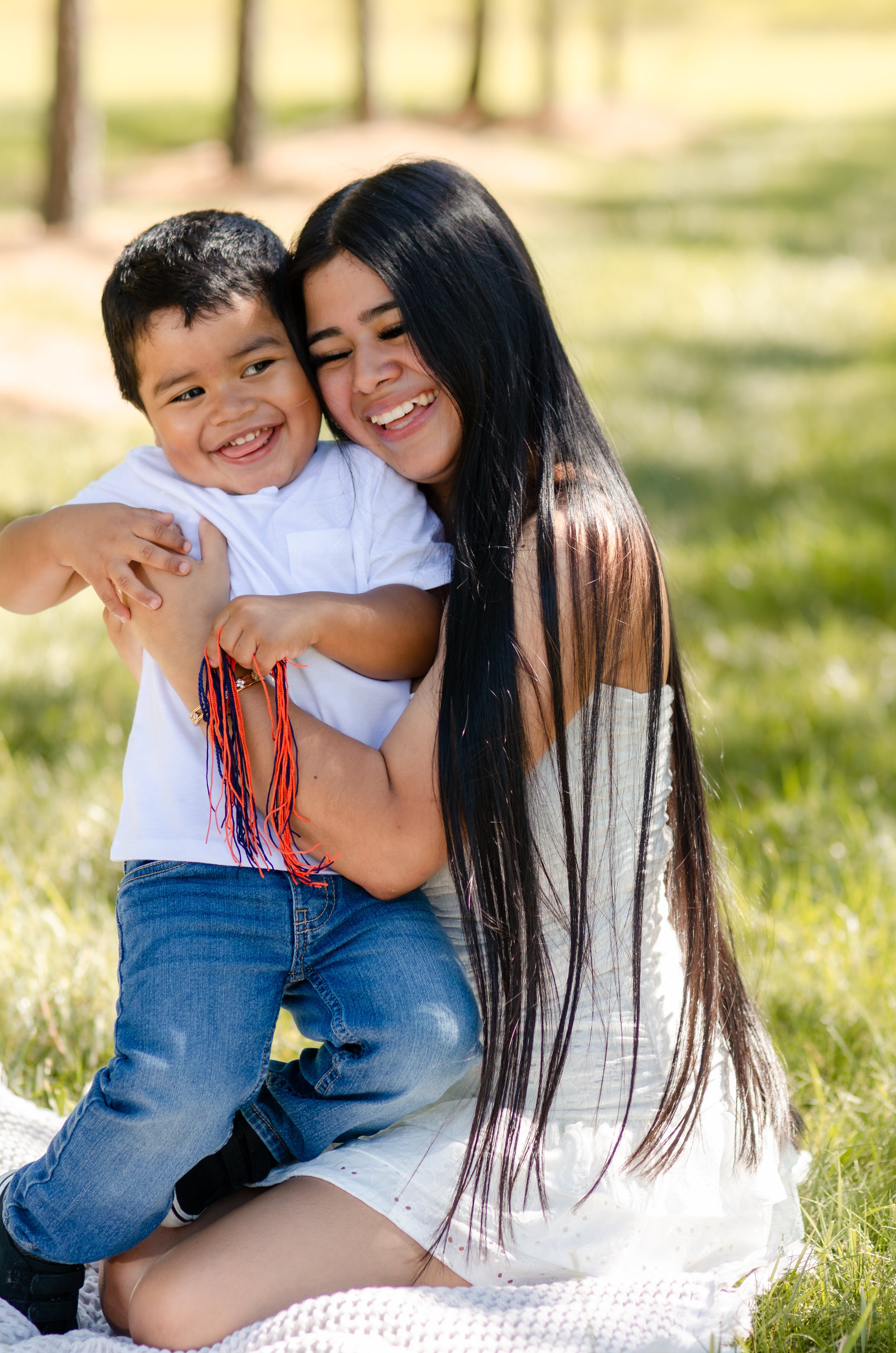 Maryville outdoor graduation photos featuring mom and son interacting naturally