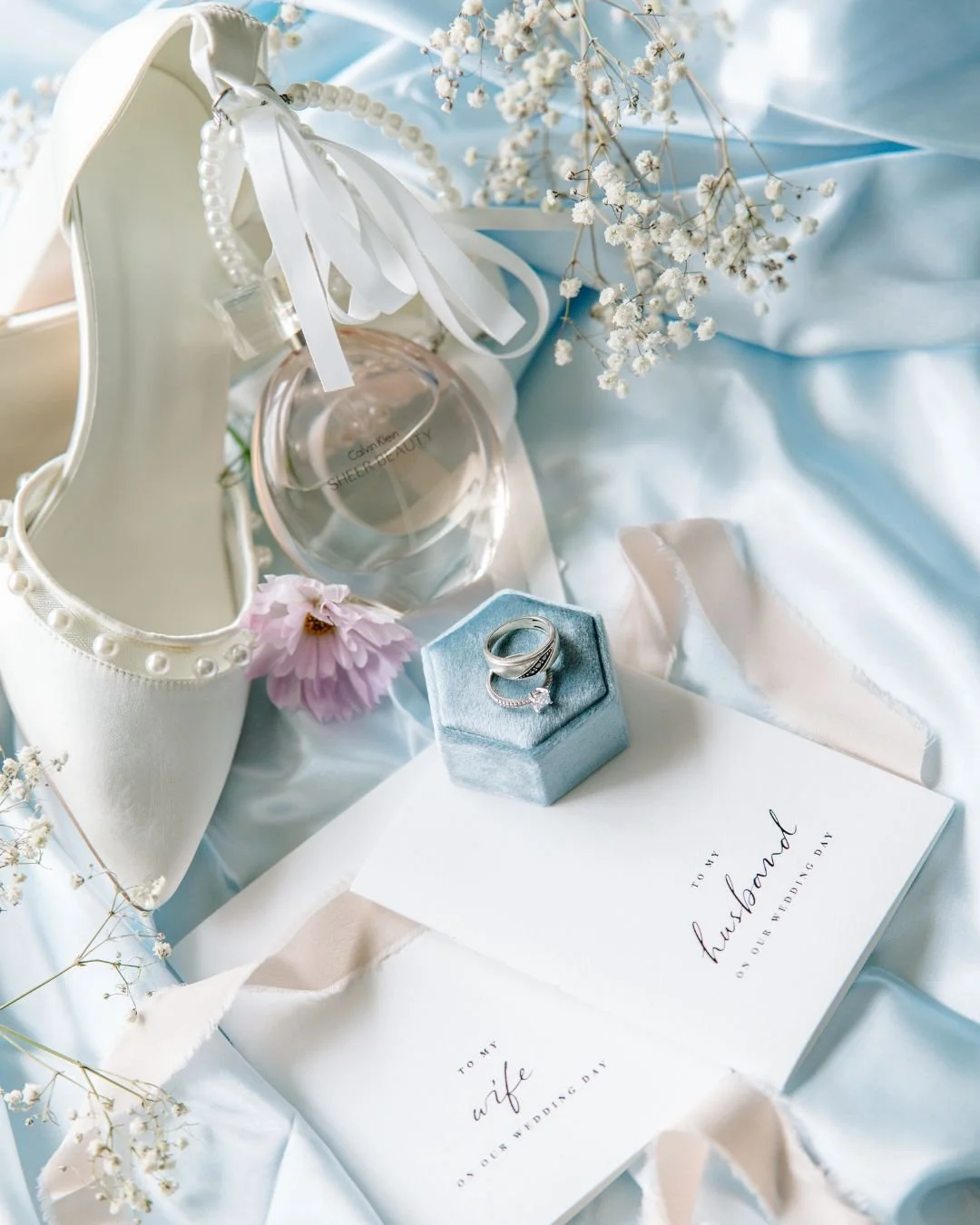 Knoxville Wedding detail photo featuring rings and bouquet