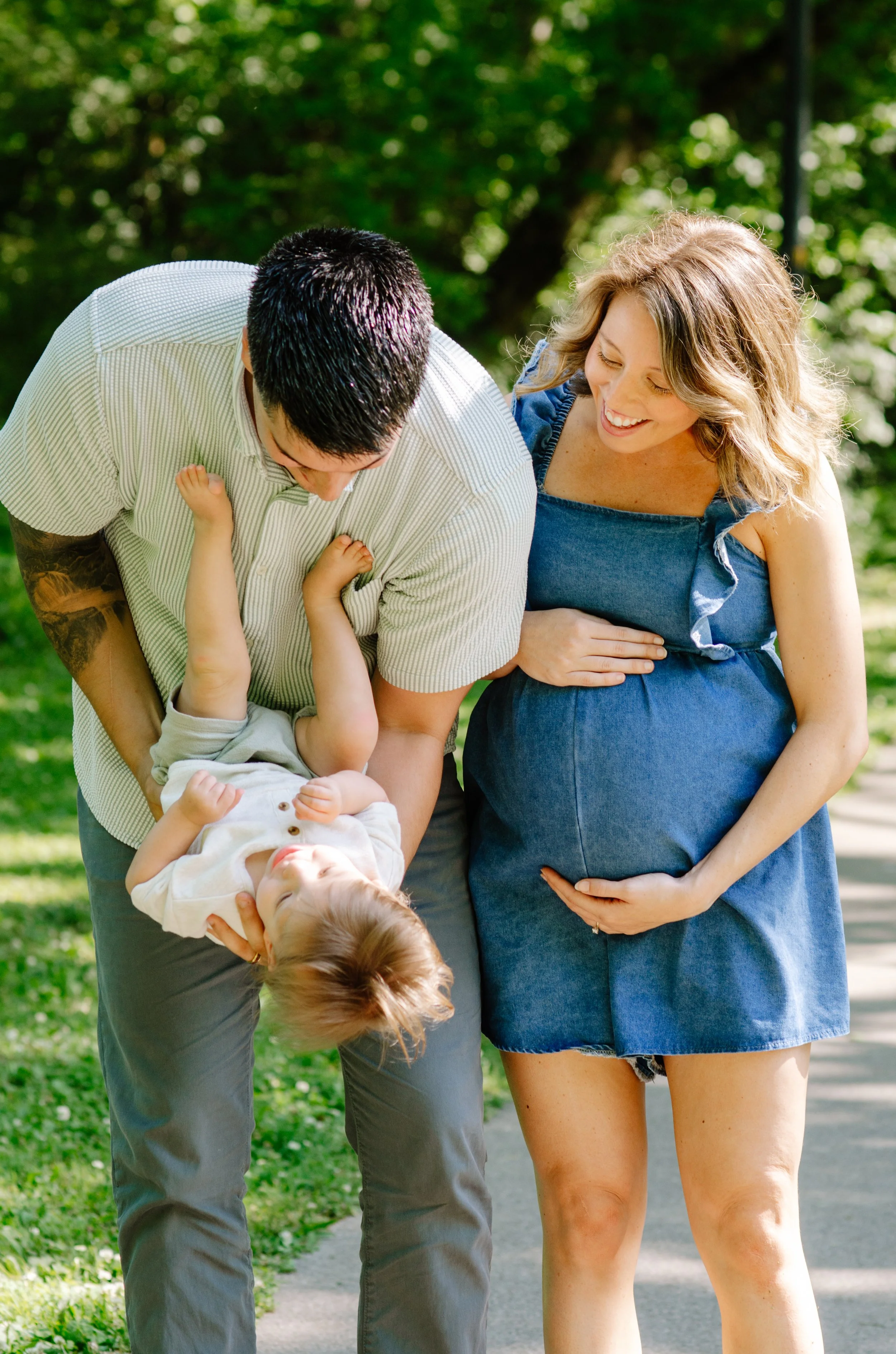 Parents playing with their children during a lifestyle family photo session in Maryville Tennessee