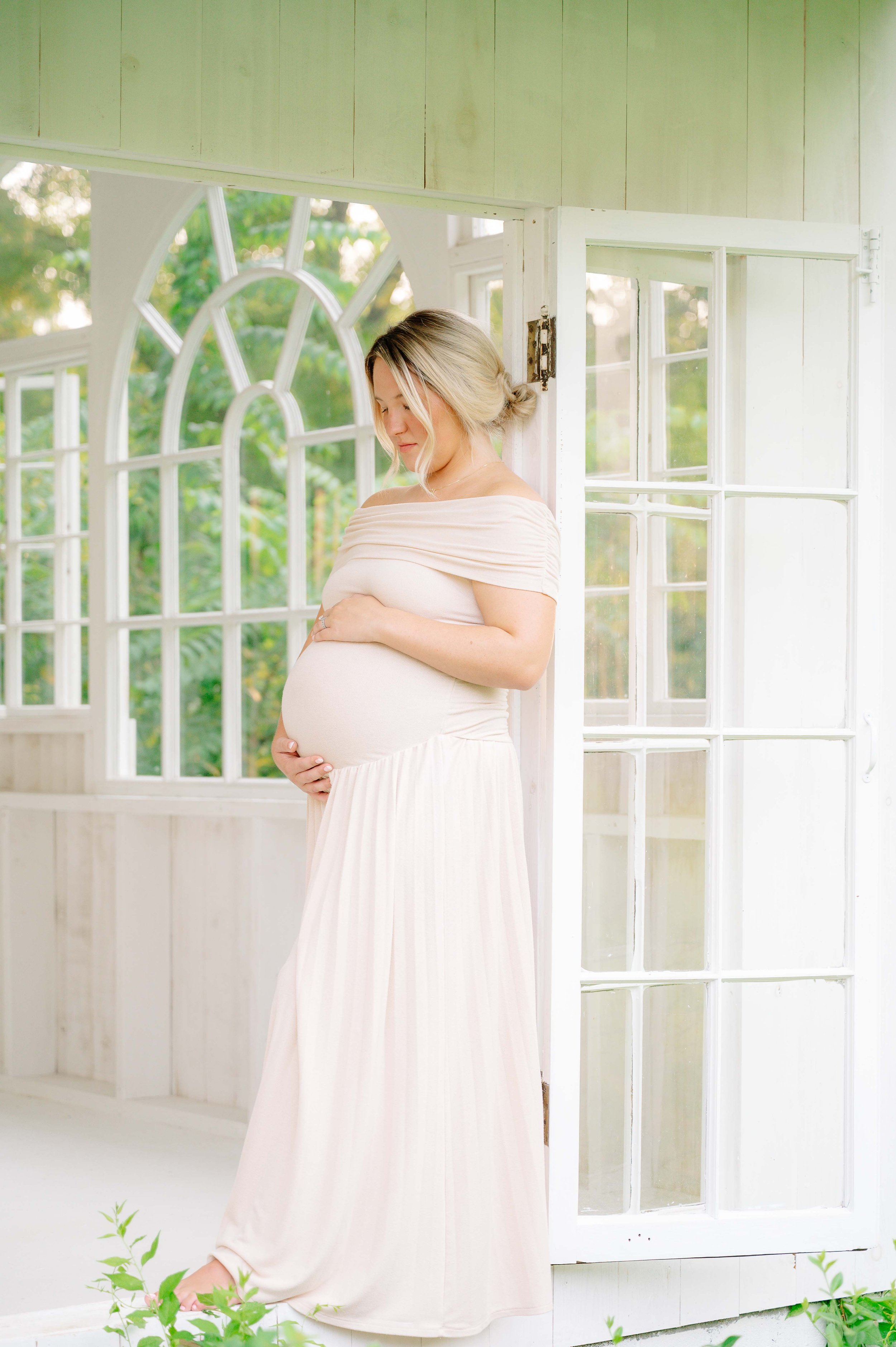Pregnant woman in blush gown at The Holmstead Studio, Knoxville maternity photographer