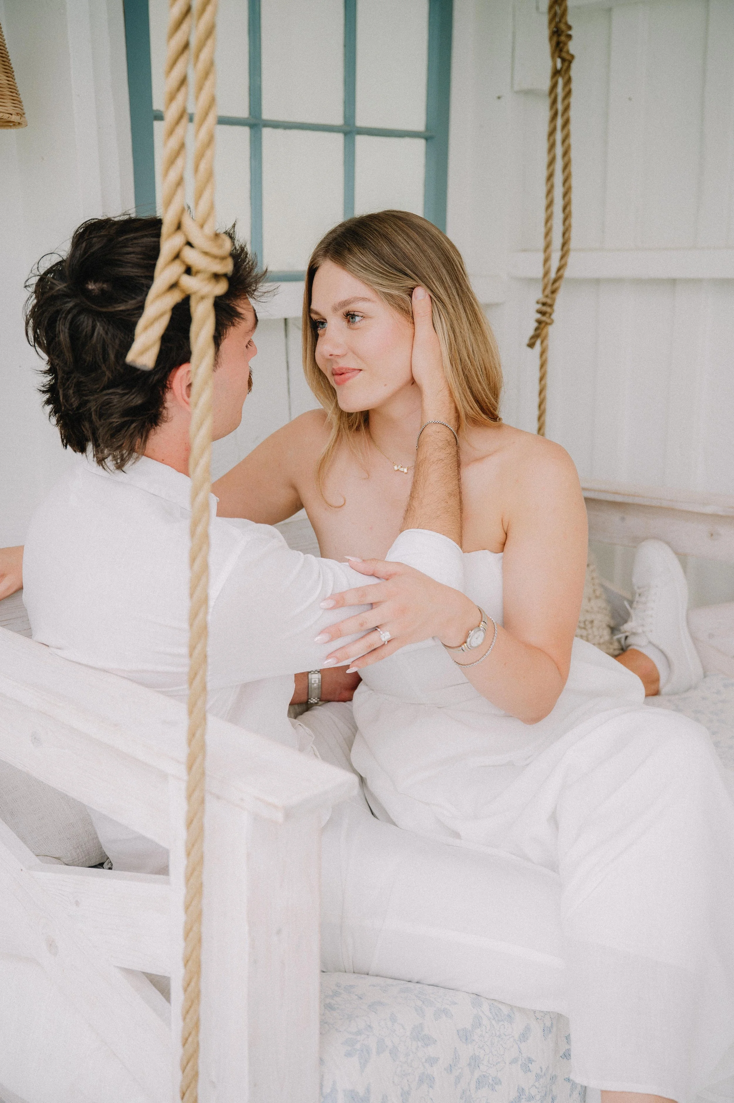 Engaged couple holding hands during their engagement photos in Knoxville, TN