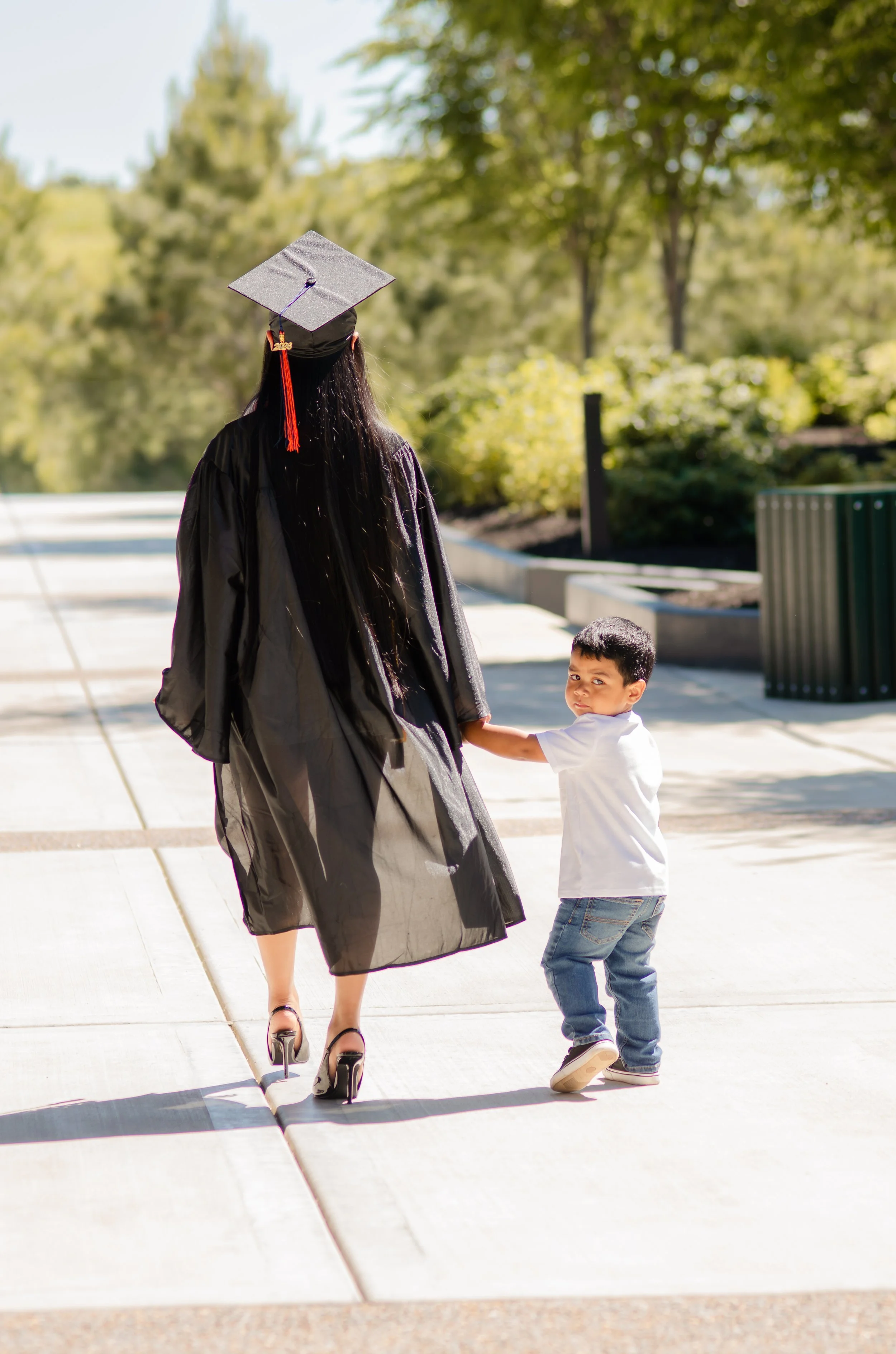 Graduation photos in a park in Maryville with with mom and son