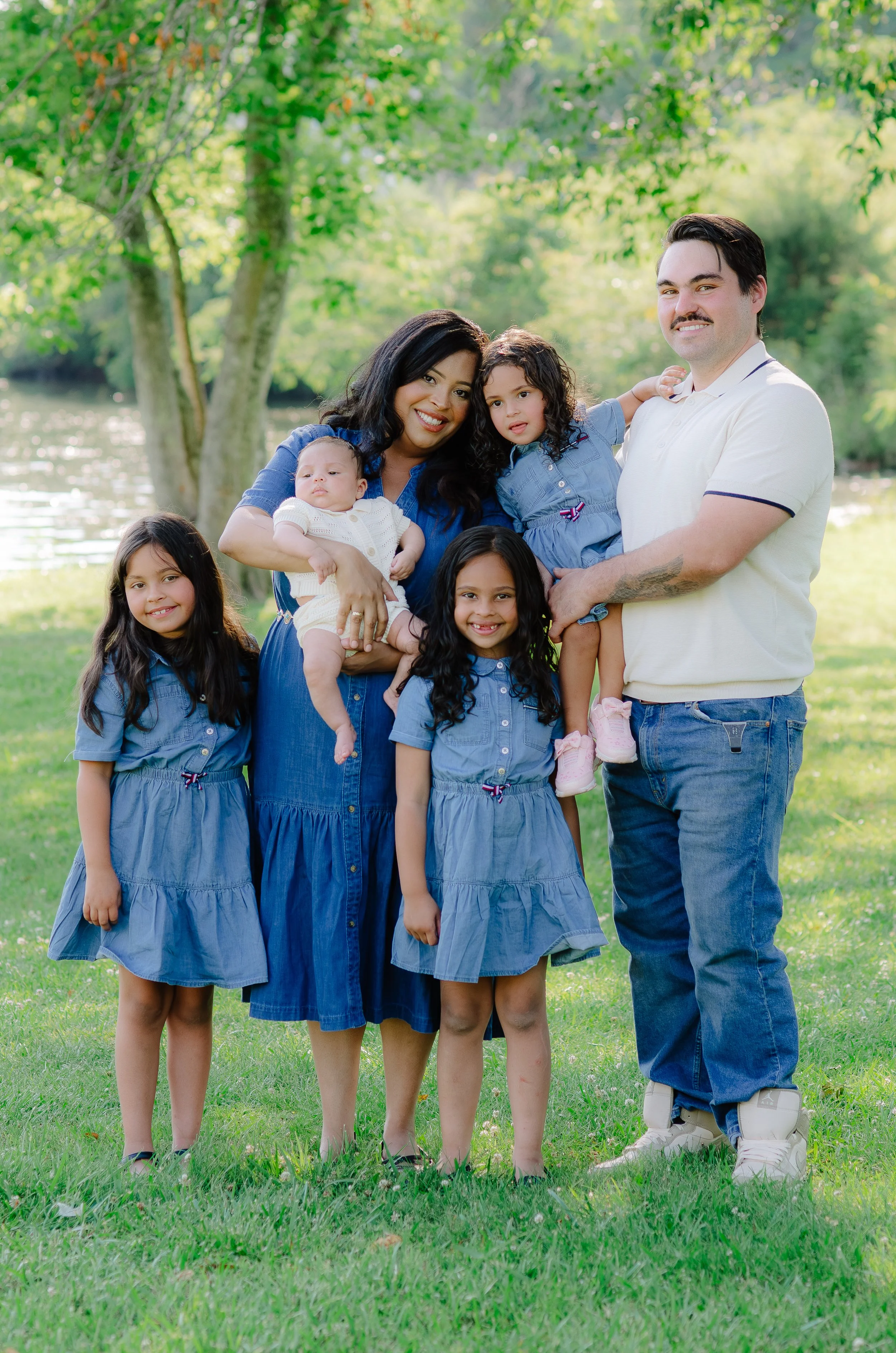 Family of six with a newborn enjoying an outdoor photography session at Melton Hill Park in Knoxville TN