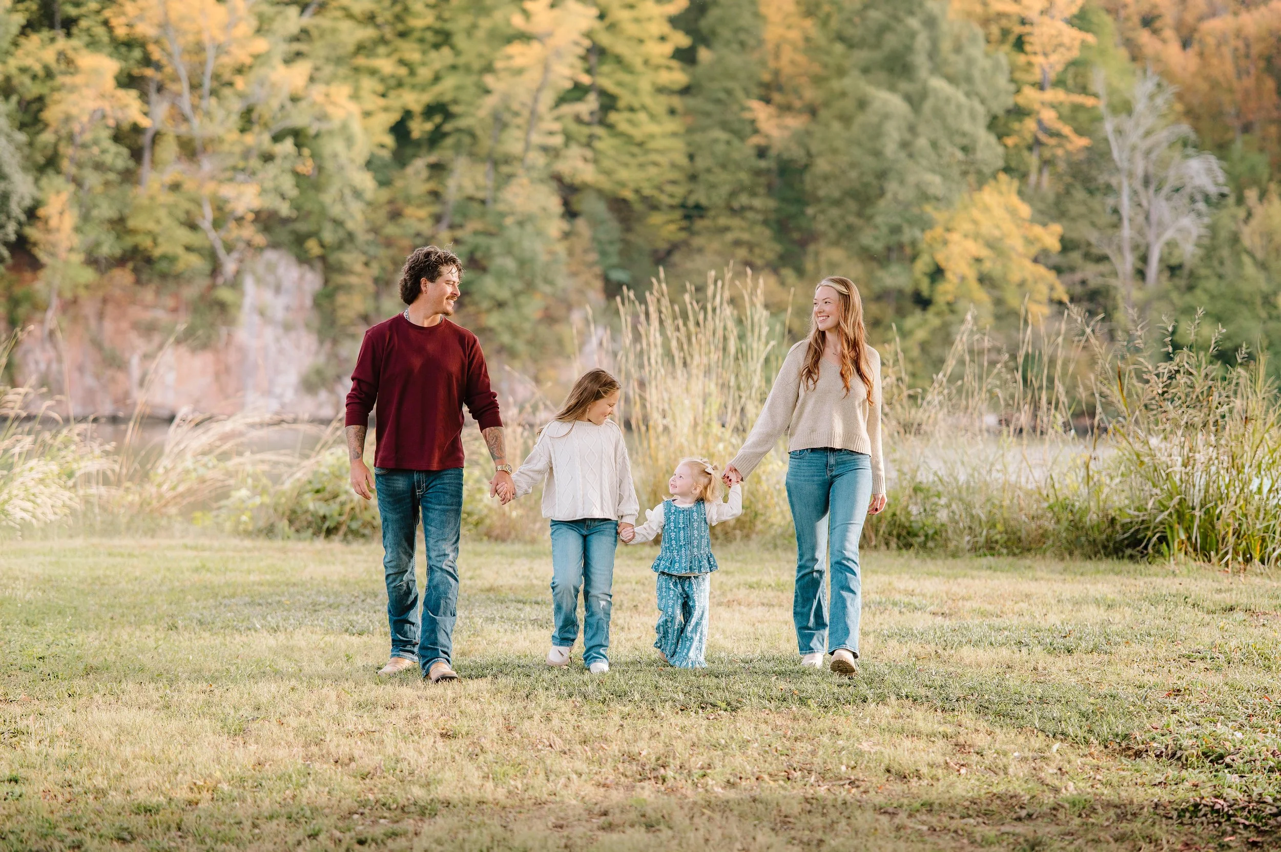 Smiling family portrait captured by a Maryville family photographer