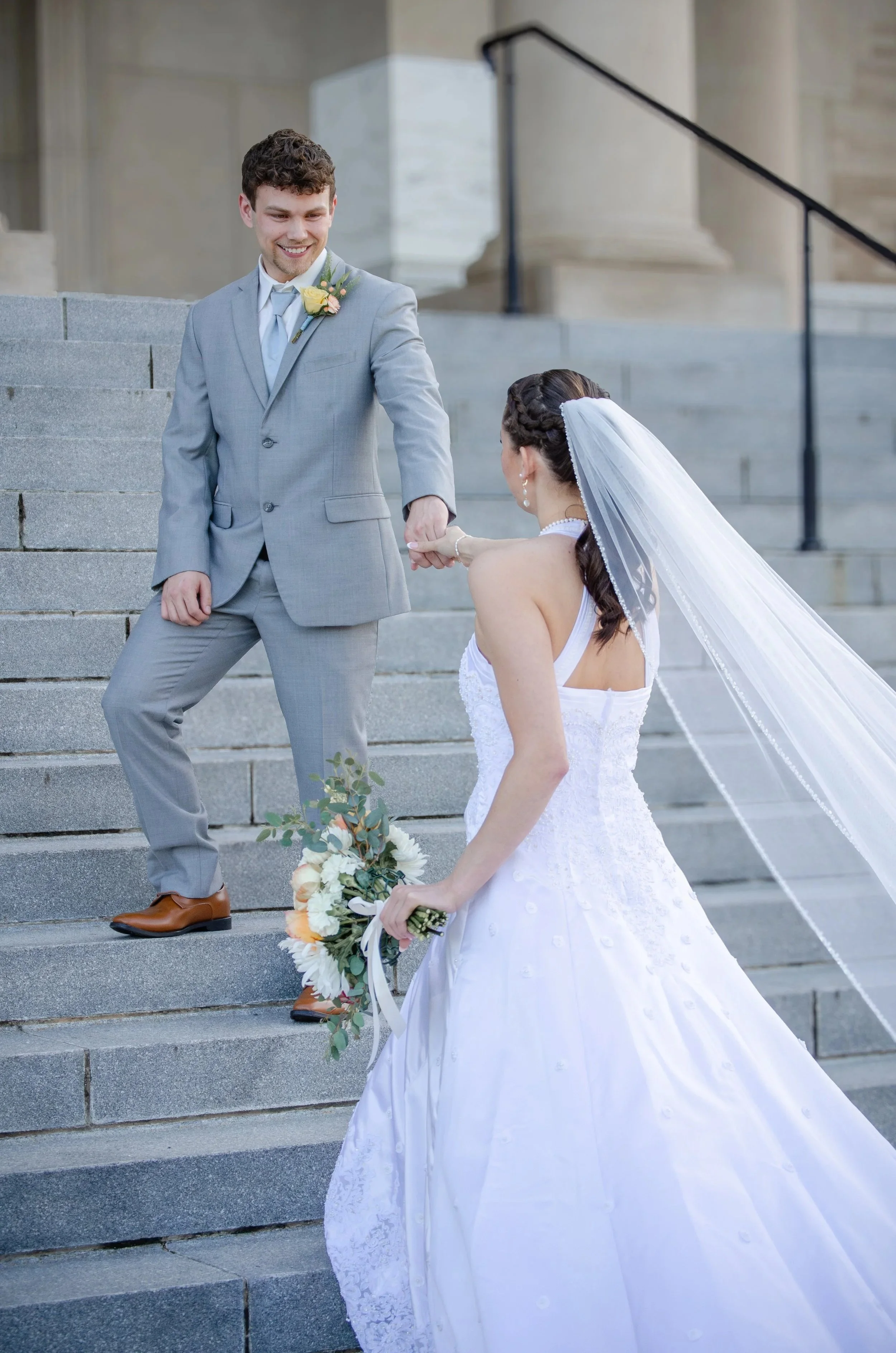 Newly married couple walking together after their Maryville wedding