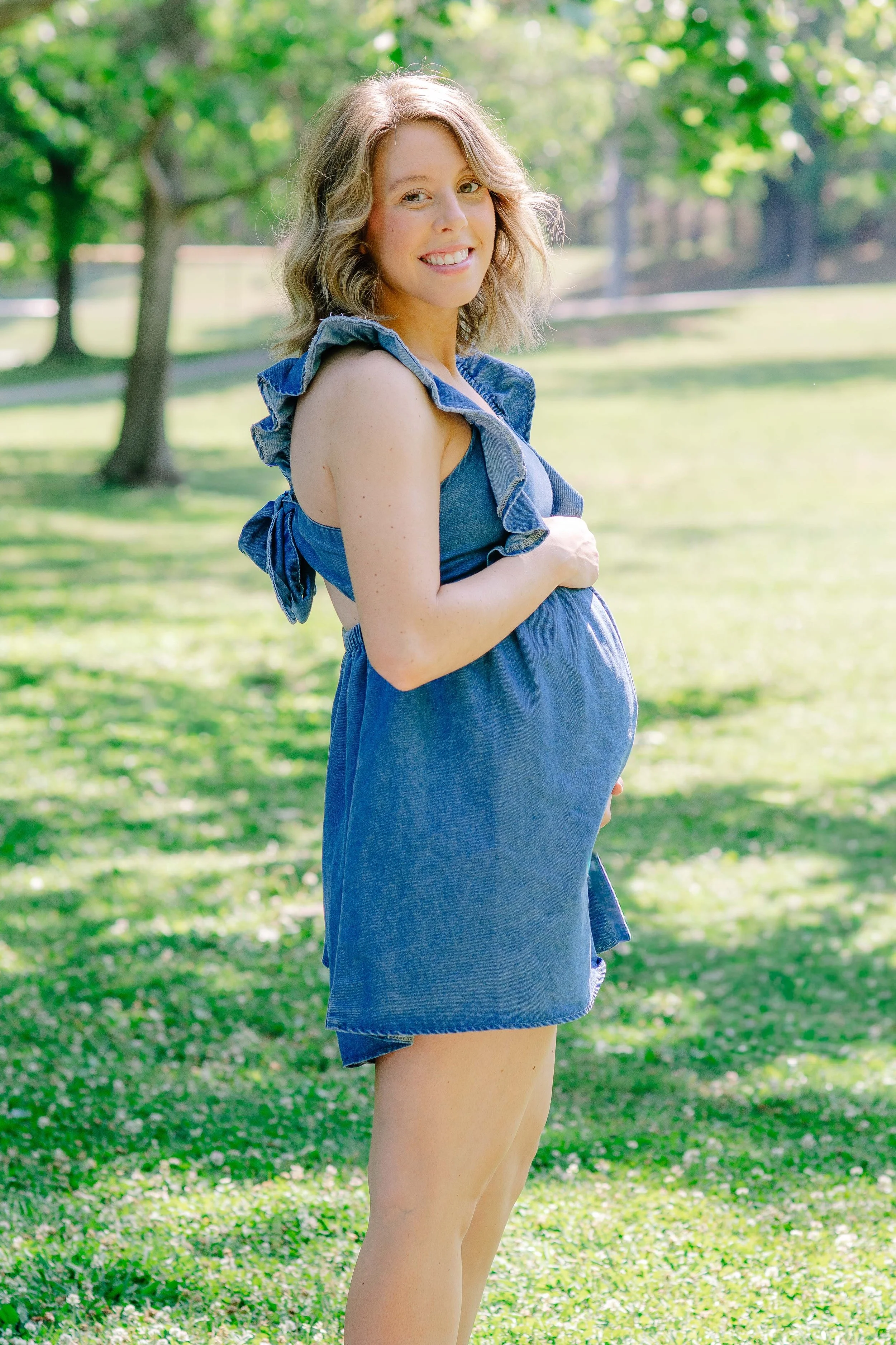 Outdoor maternity portrait at Sandy Springs Park in Maryville, Tennessee, surrounded by soft natural greenery