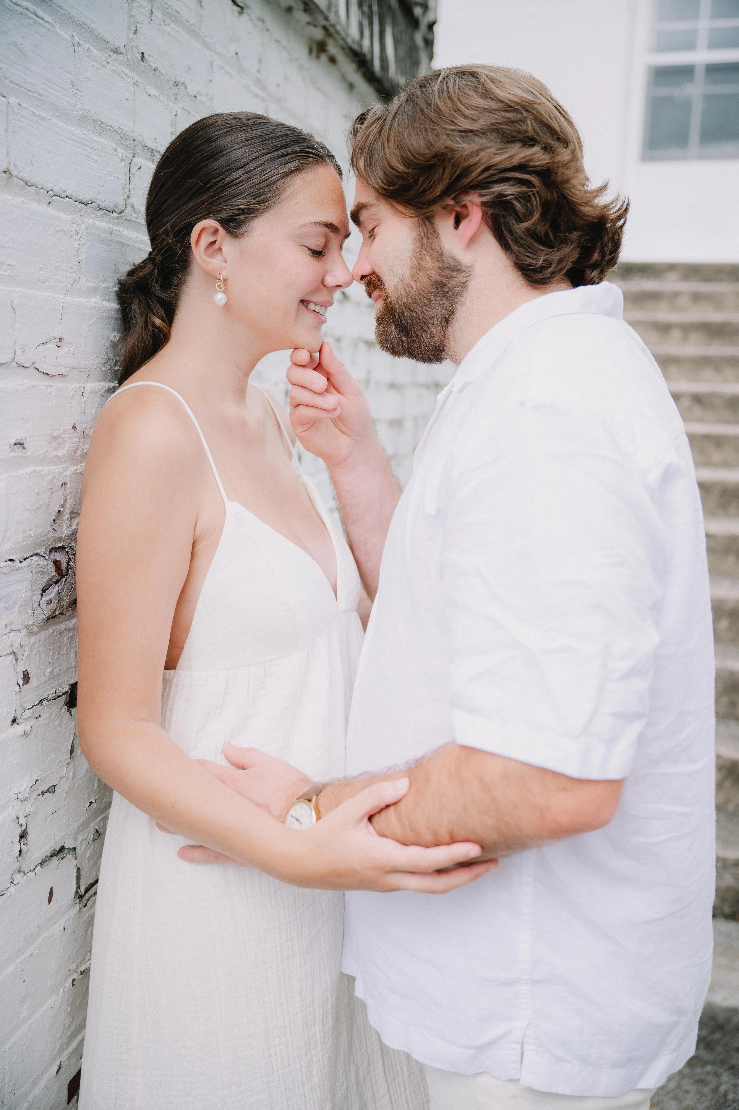 Candid engagement photo of a couple at Bleak House in Knoxville, Tennessee