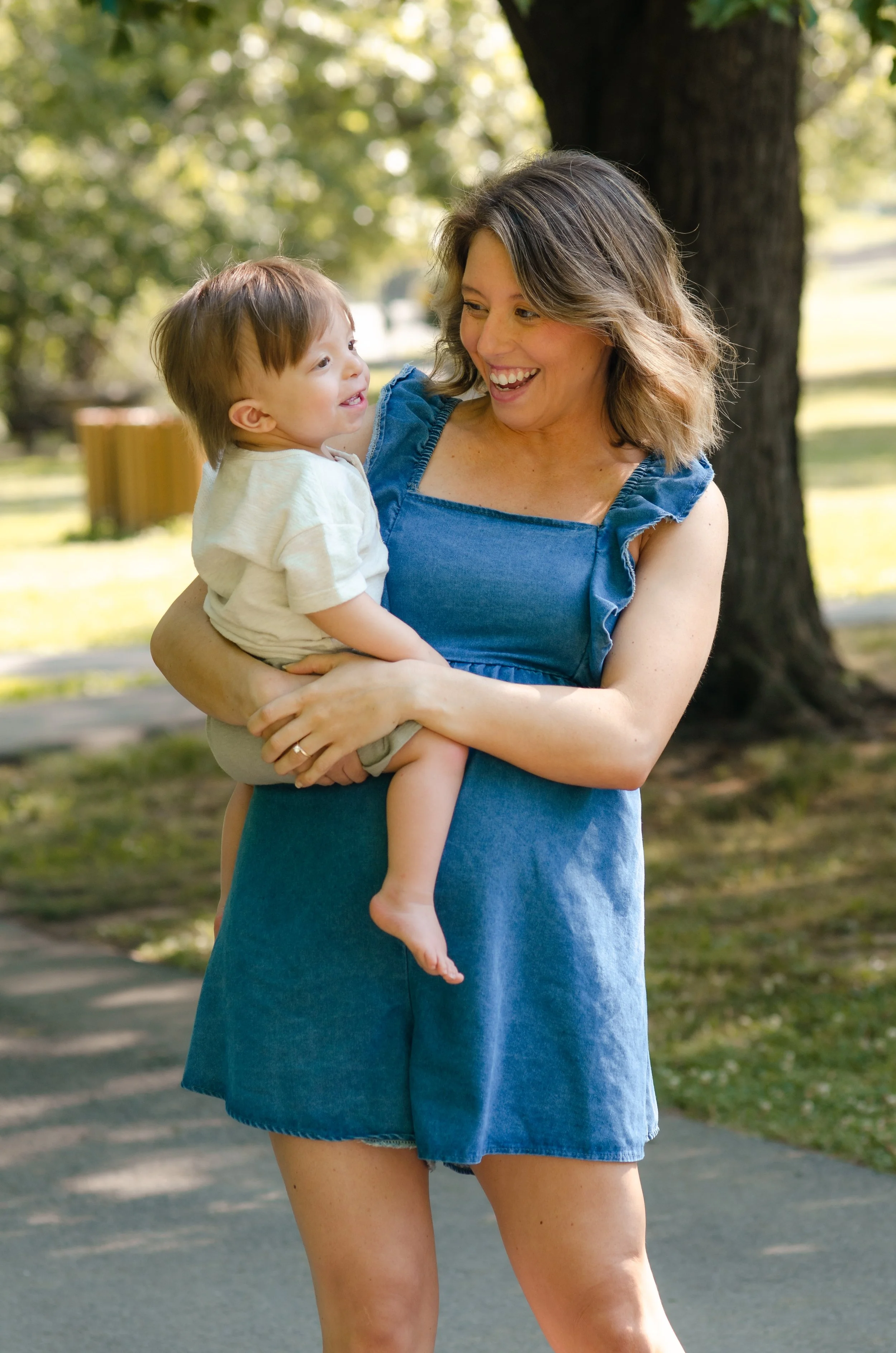Maryville family photographer capturing outdoor photos in a park