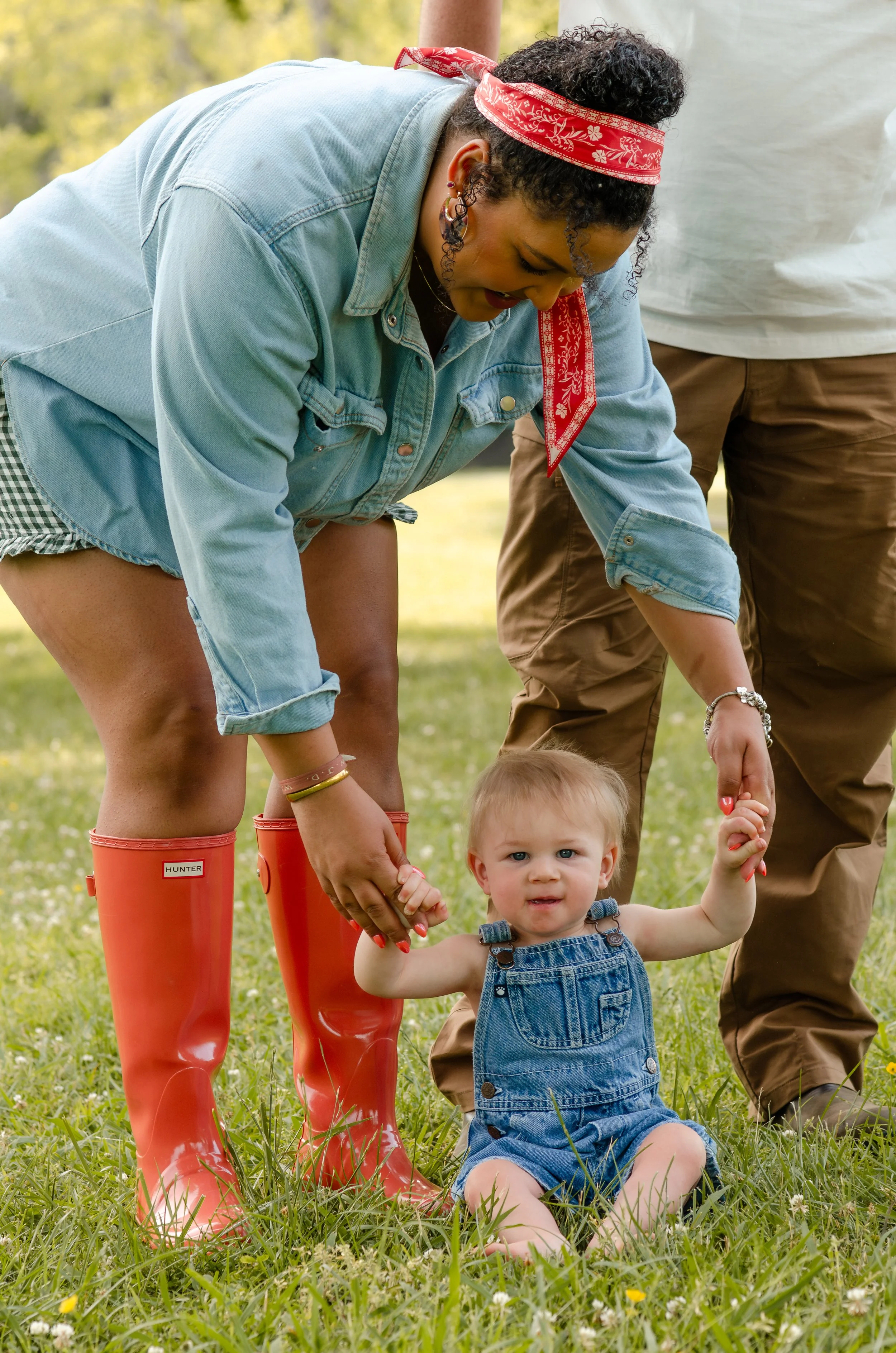 Candid family portrait capturing genuine connection and laughter, with baby and mom at Sequoya Hills in Knoxville Tn