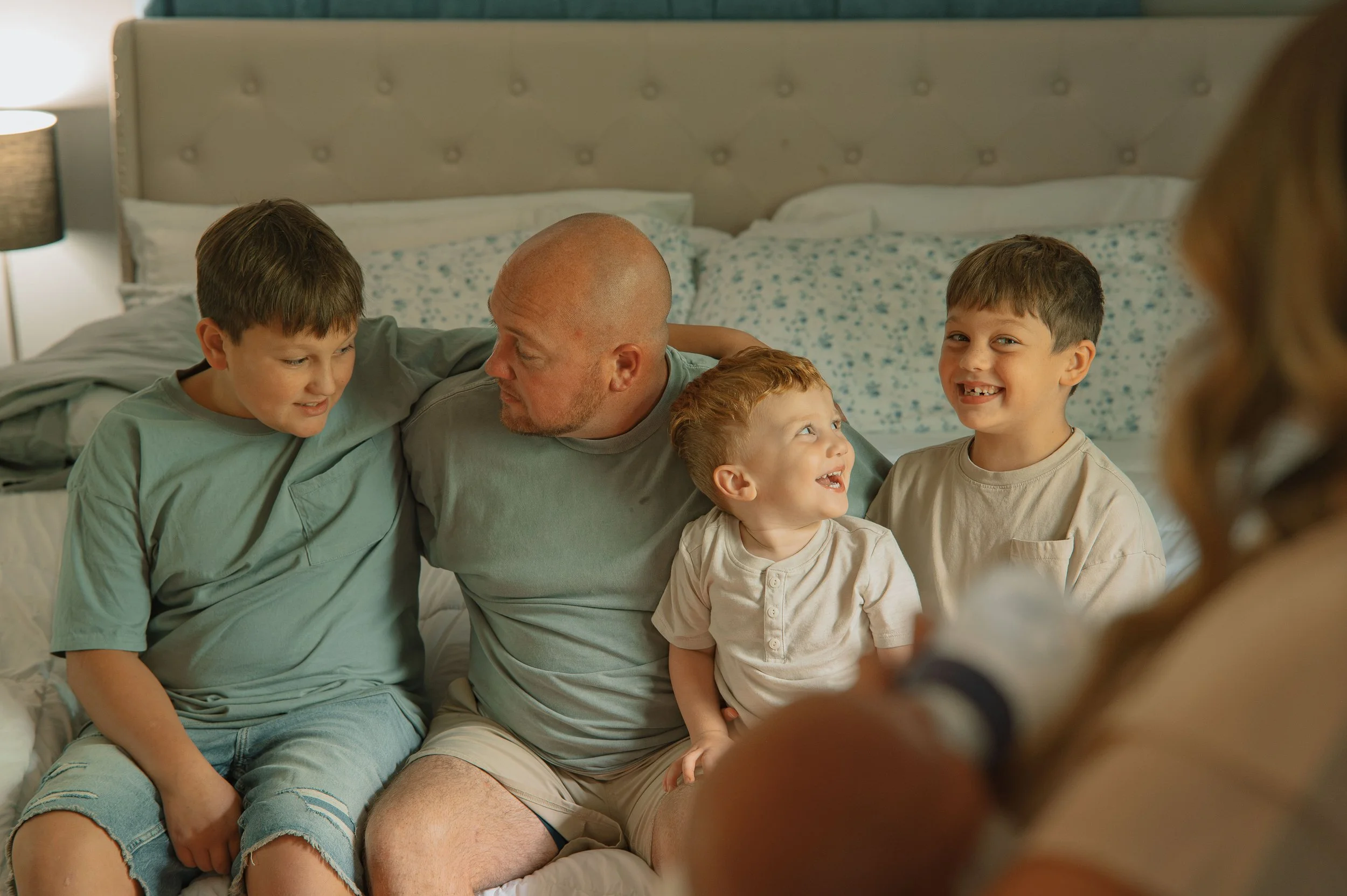 Smiling family portrait captured by a Maryville family photographer