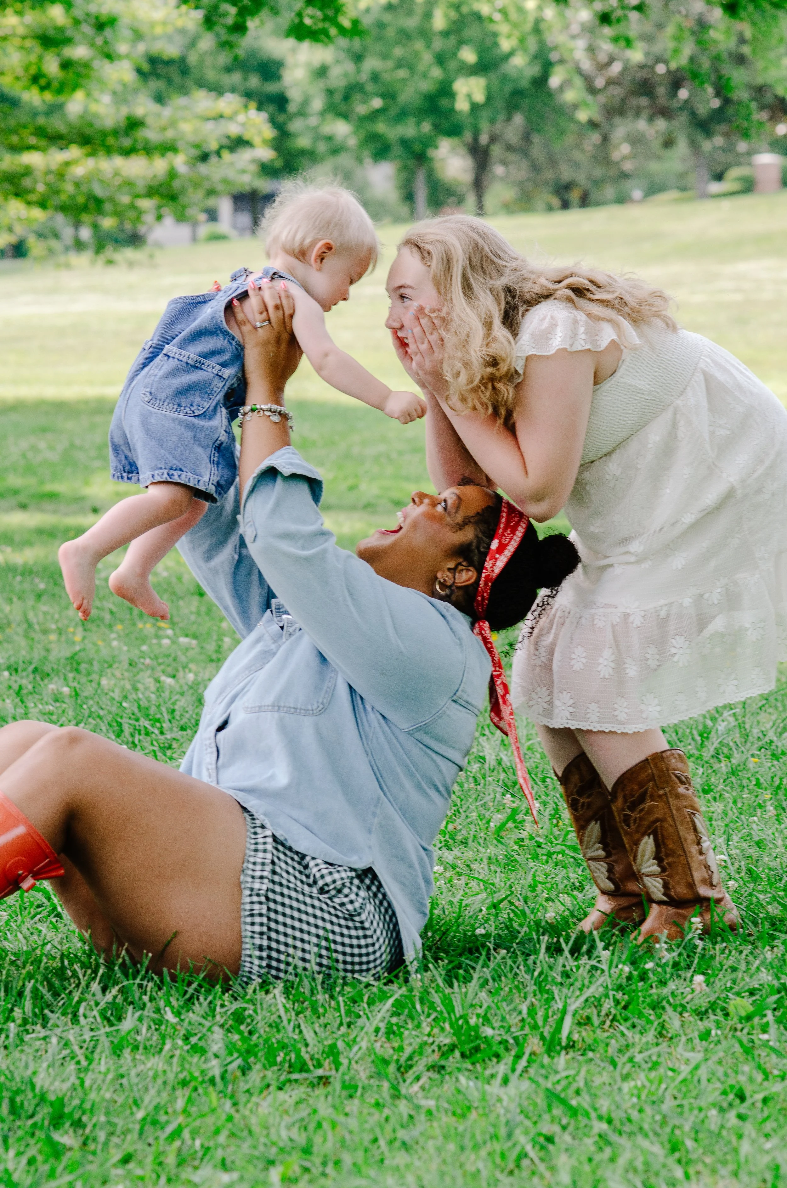 Young children playing with their parents during a lifestyle family photography session