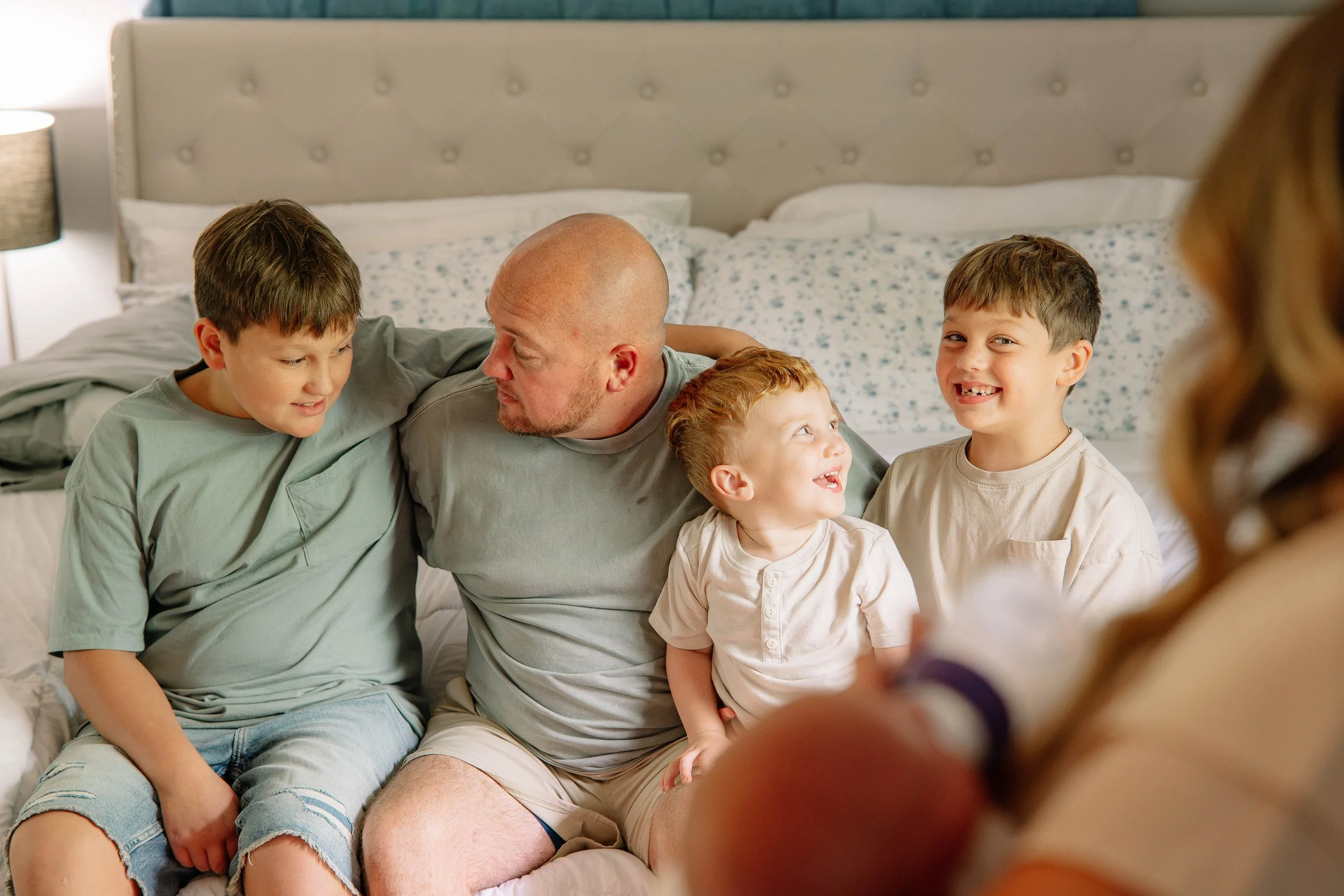 Smiling family portrait captured by a Maryville family photographer