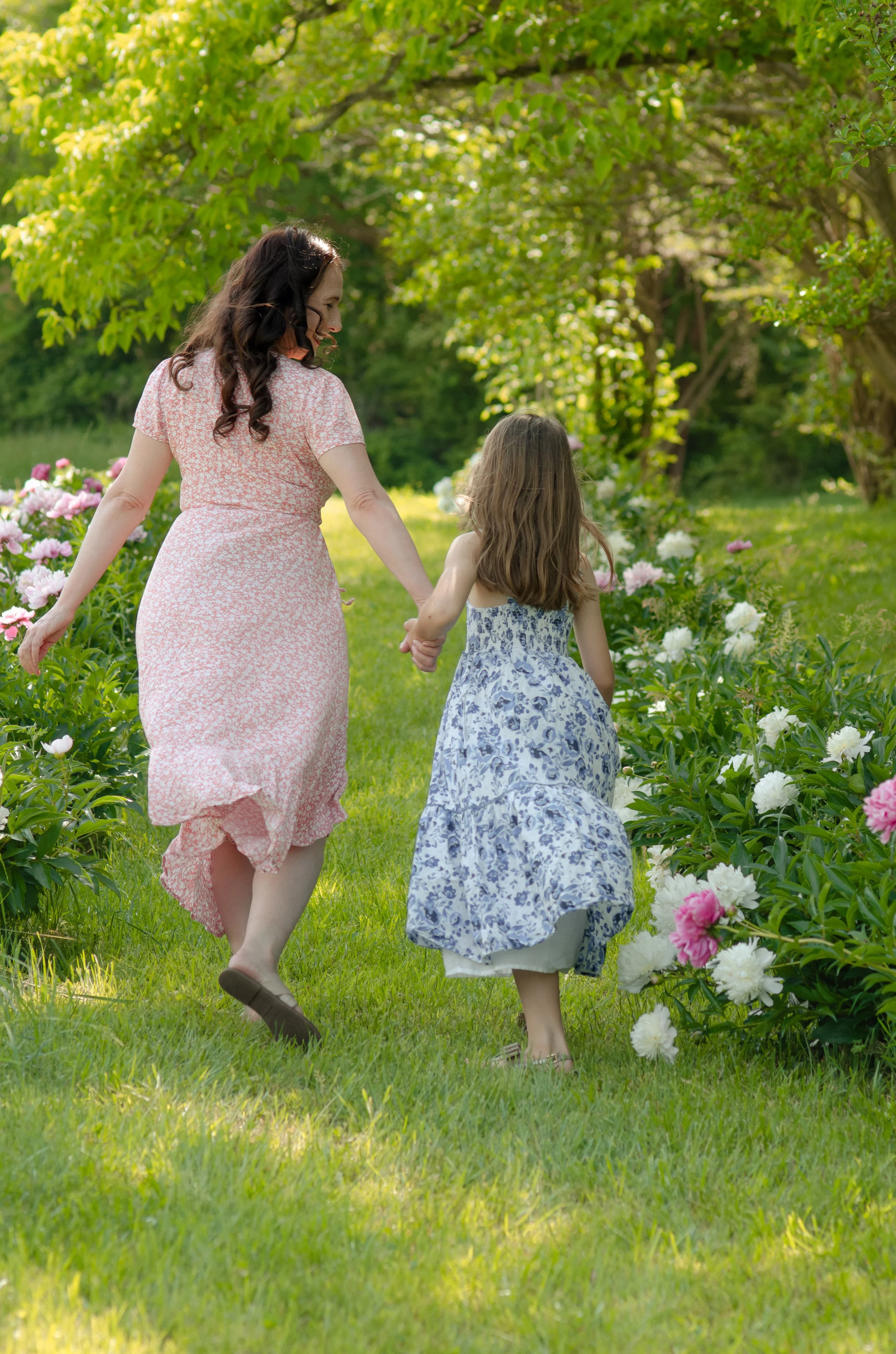 Playful mommy and me session in Knoxville with young children in outdoor setting