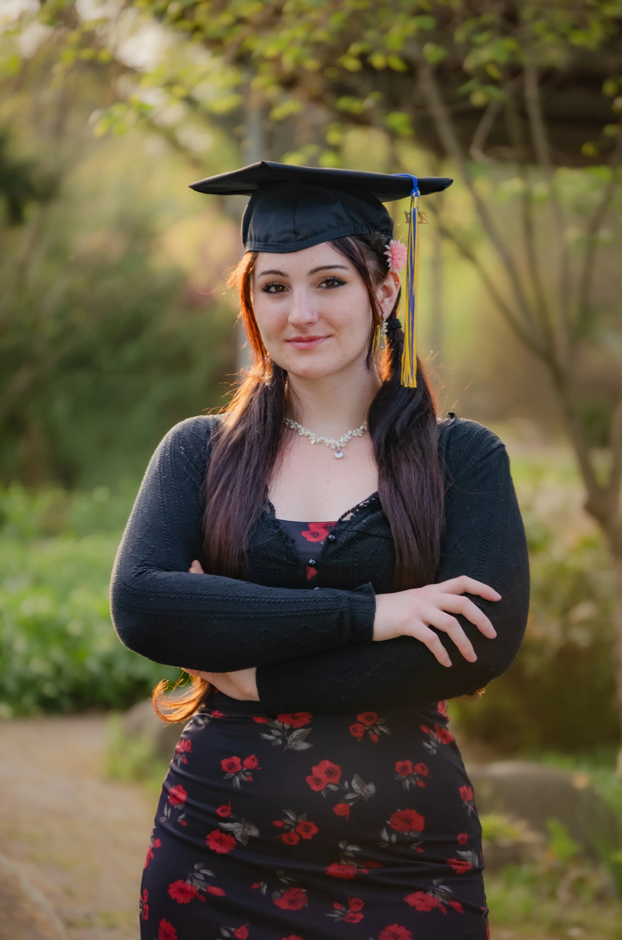 College graduate wearing cap and gown during a graduation session in Tennessee.