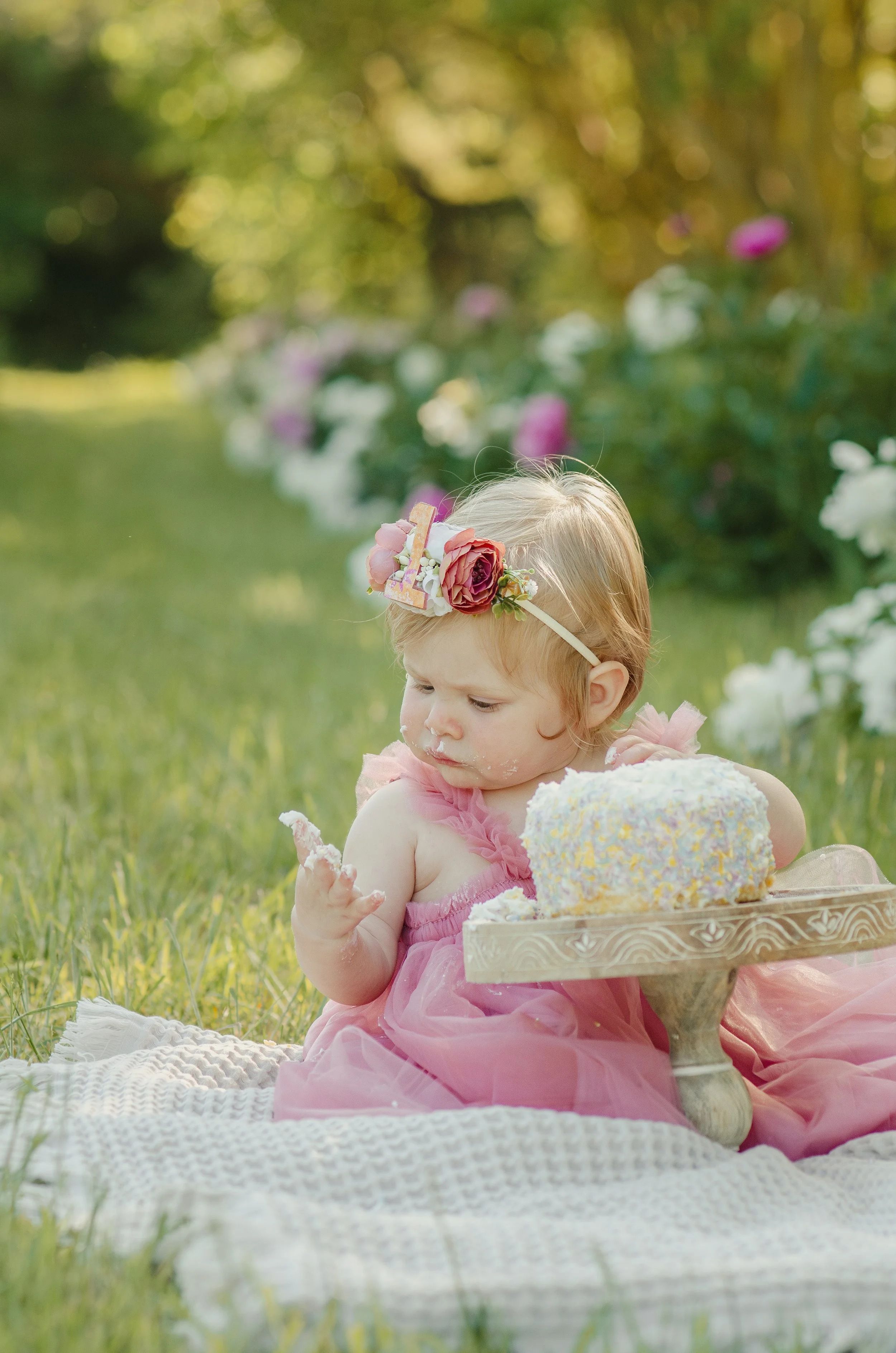 Baby milestone session in Knoxville with outdoor setting and light, airy style