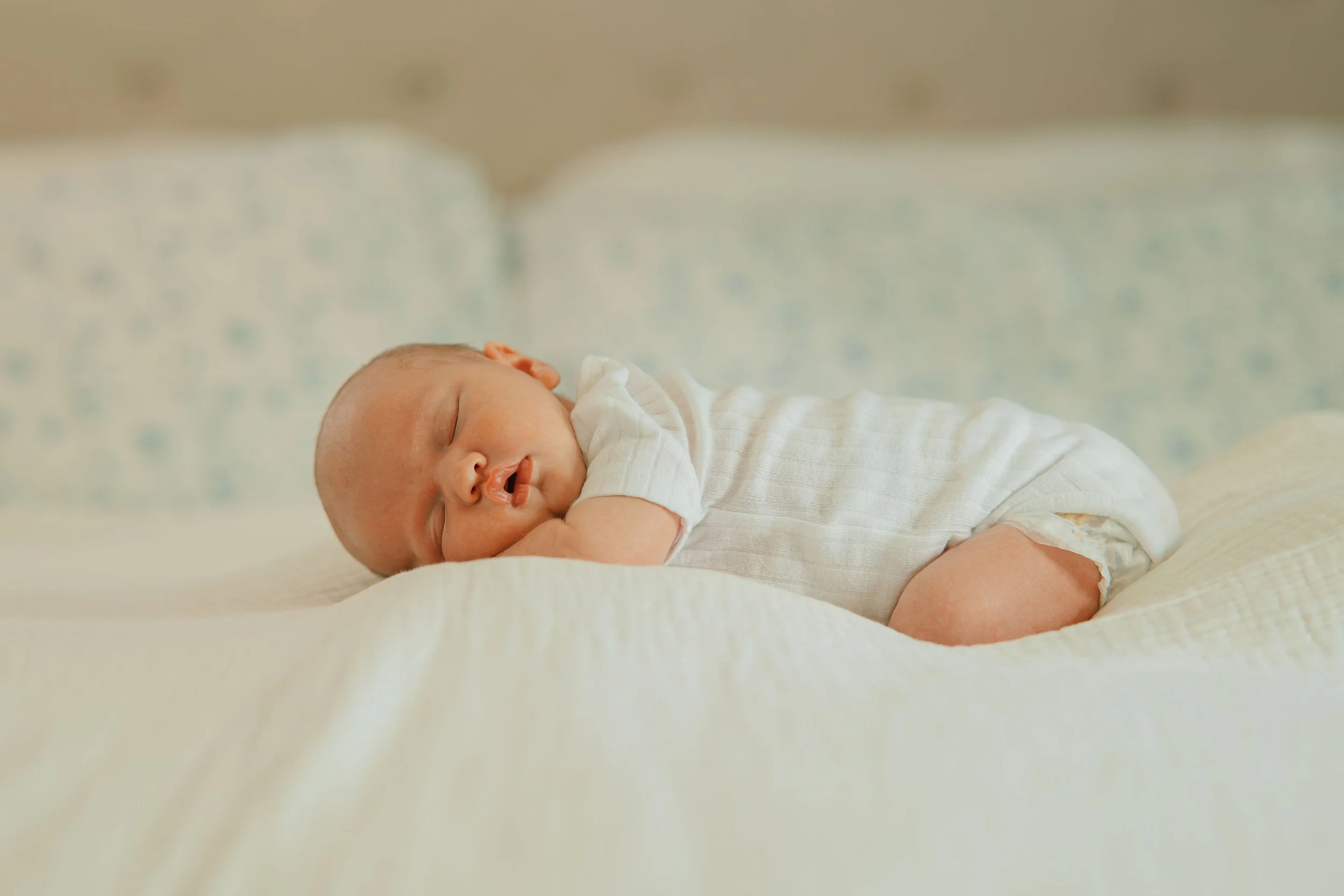 Newborn portraits captured naturally inside the family home