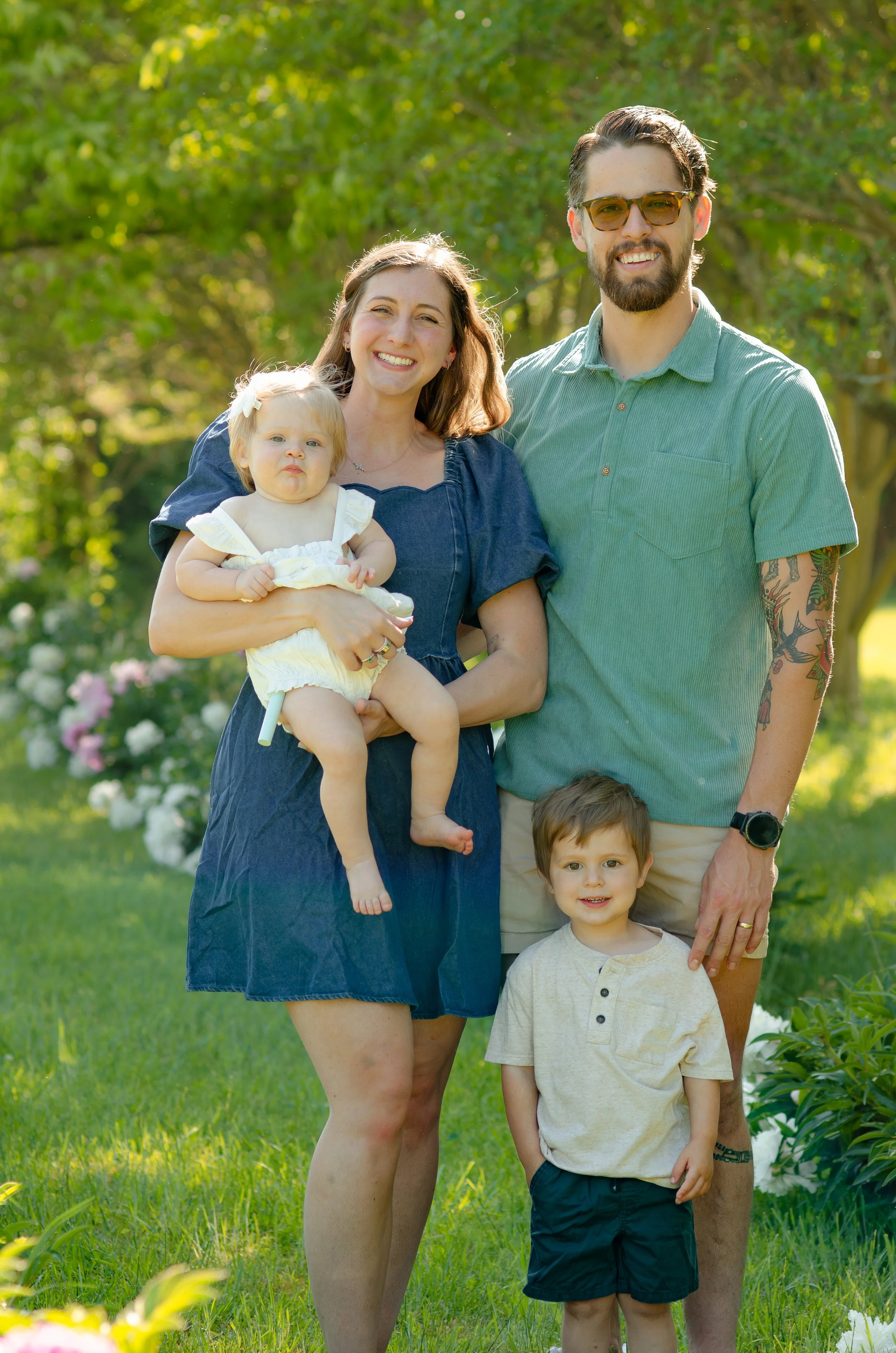 Knoxville family photographer capturing outdoor photos with active children at sunset