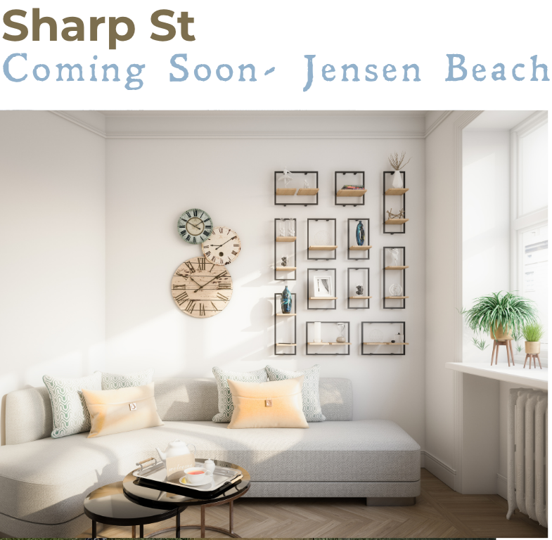 Bright, modern living room with a light-colored sofa, decorative pillows, wall-mounted shelves with books and ornaments, two wall clocks, a window with sunlight, and potted plants on the windowsill.