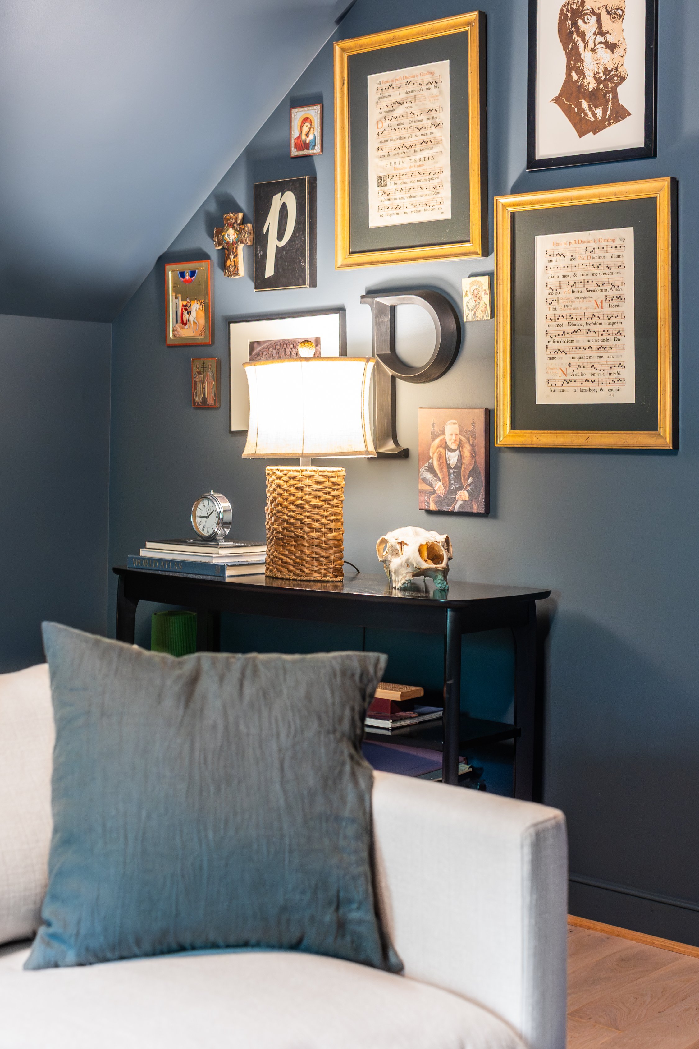 Color drench media room showcasing a gallery wall.