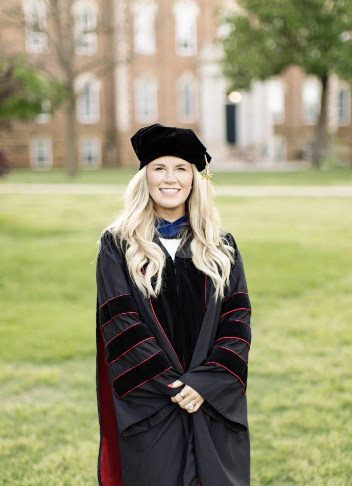Dr. Lana Henry in doctoral graduation regalia at University of Arkansas.