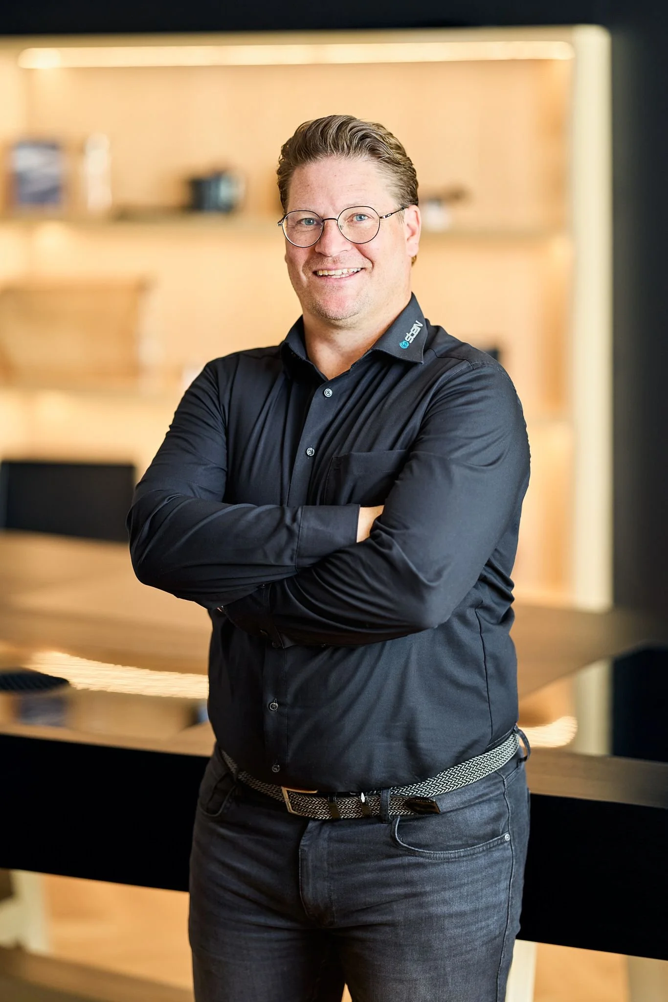 Geschäftsführer Michael fischbach. Er lächelt freundlich in die Kamera.