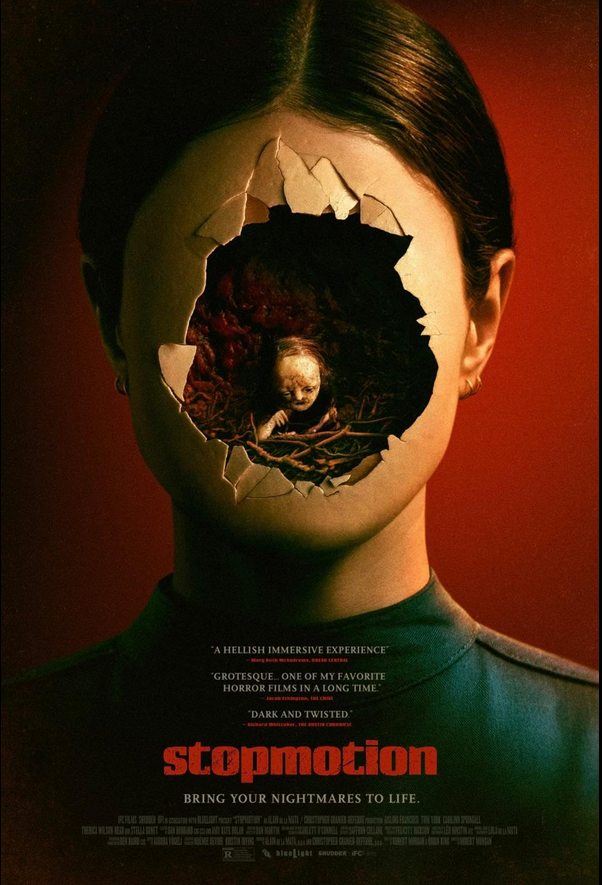 A promotional poster for the horror film 'Stopmotion' shows a woman's face with a large hole in the middle. Inside the hole, a sinister creature with a distorted face and long fingers is visible, surrounded by darkness and trees.