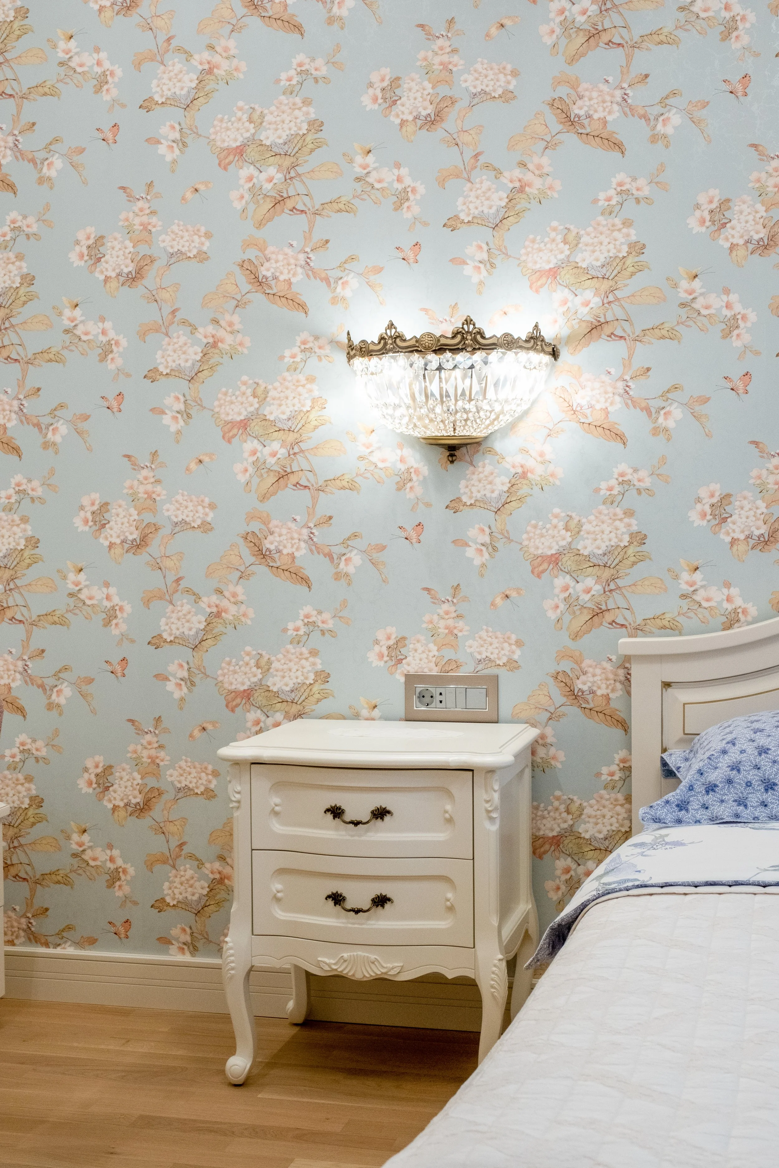 Interior detail photography, bedroom styling, floral wallpaper, soft lighting, Ontario interior