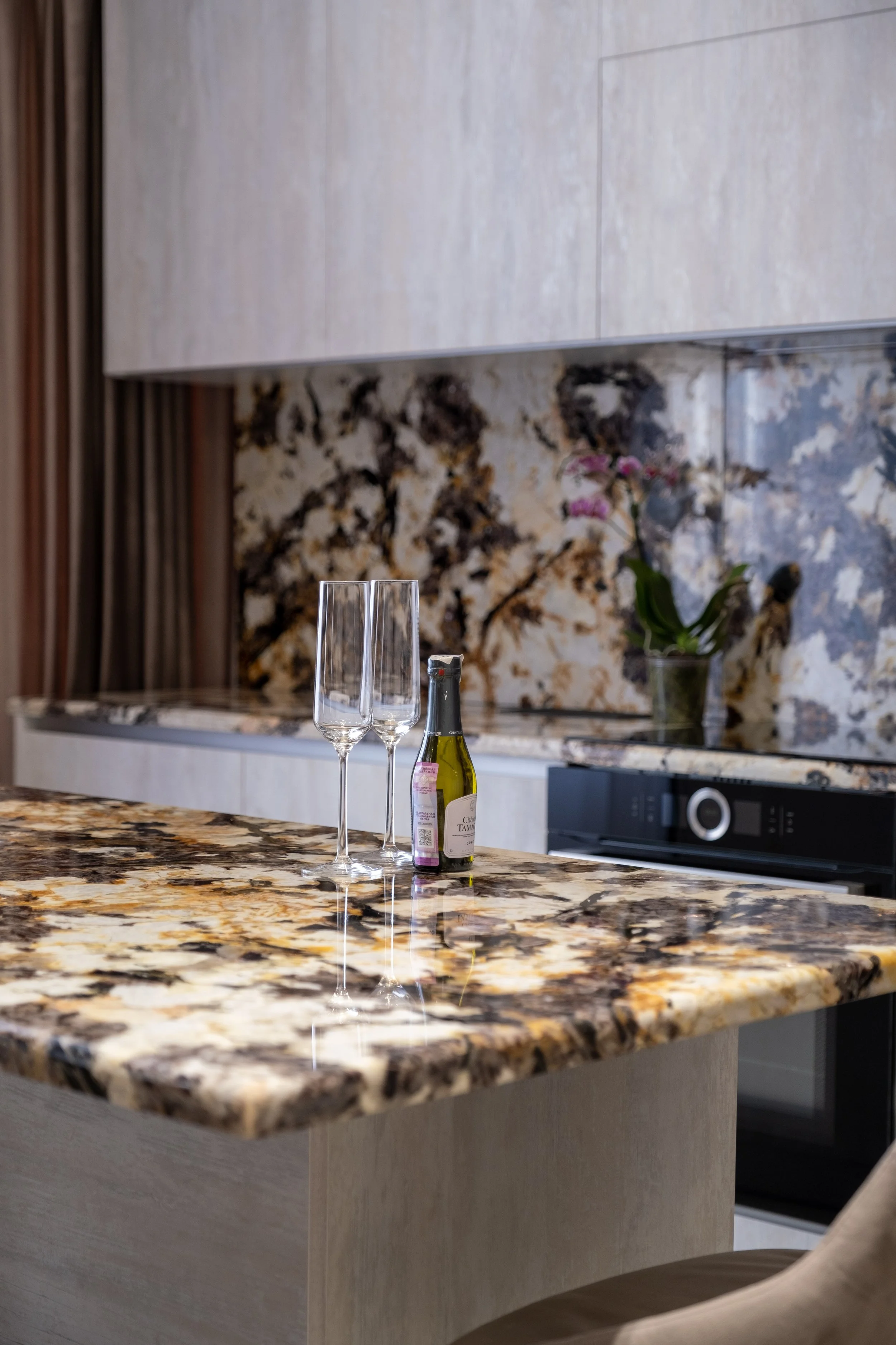 Interior detail photography, kitchen styling with wine and glassware, modern cabinetry, Niagara Ontario