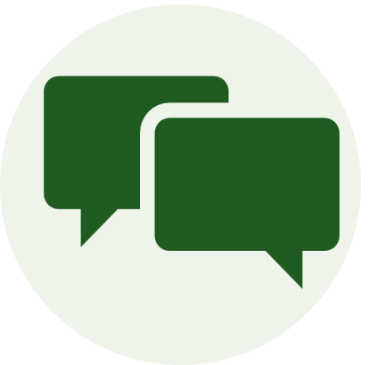 Two overlapping green speech bubbles icon on a light background.