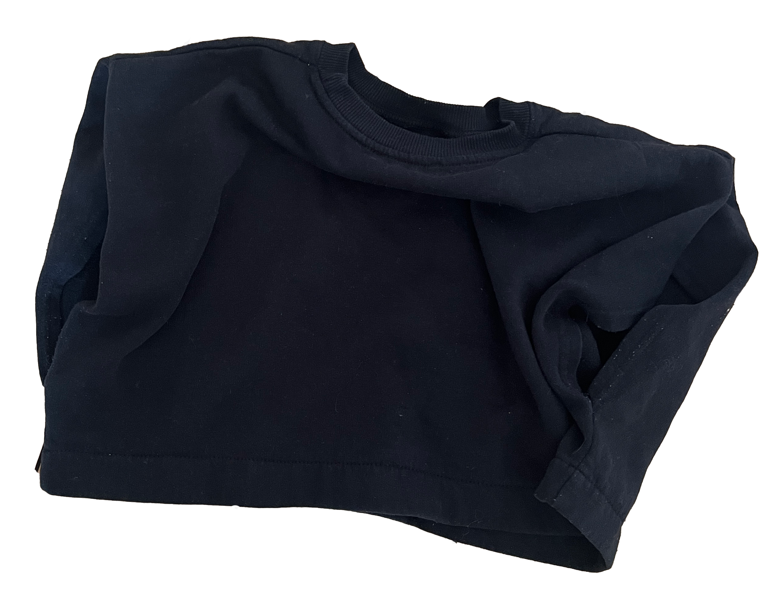 A folded black sweatshirt with a round neckline.