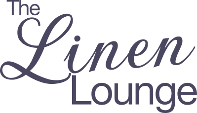 Text reading 'The Linen Lounge' in purple