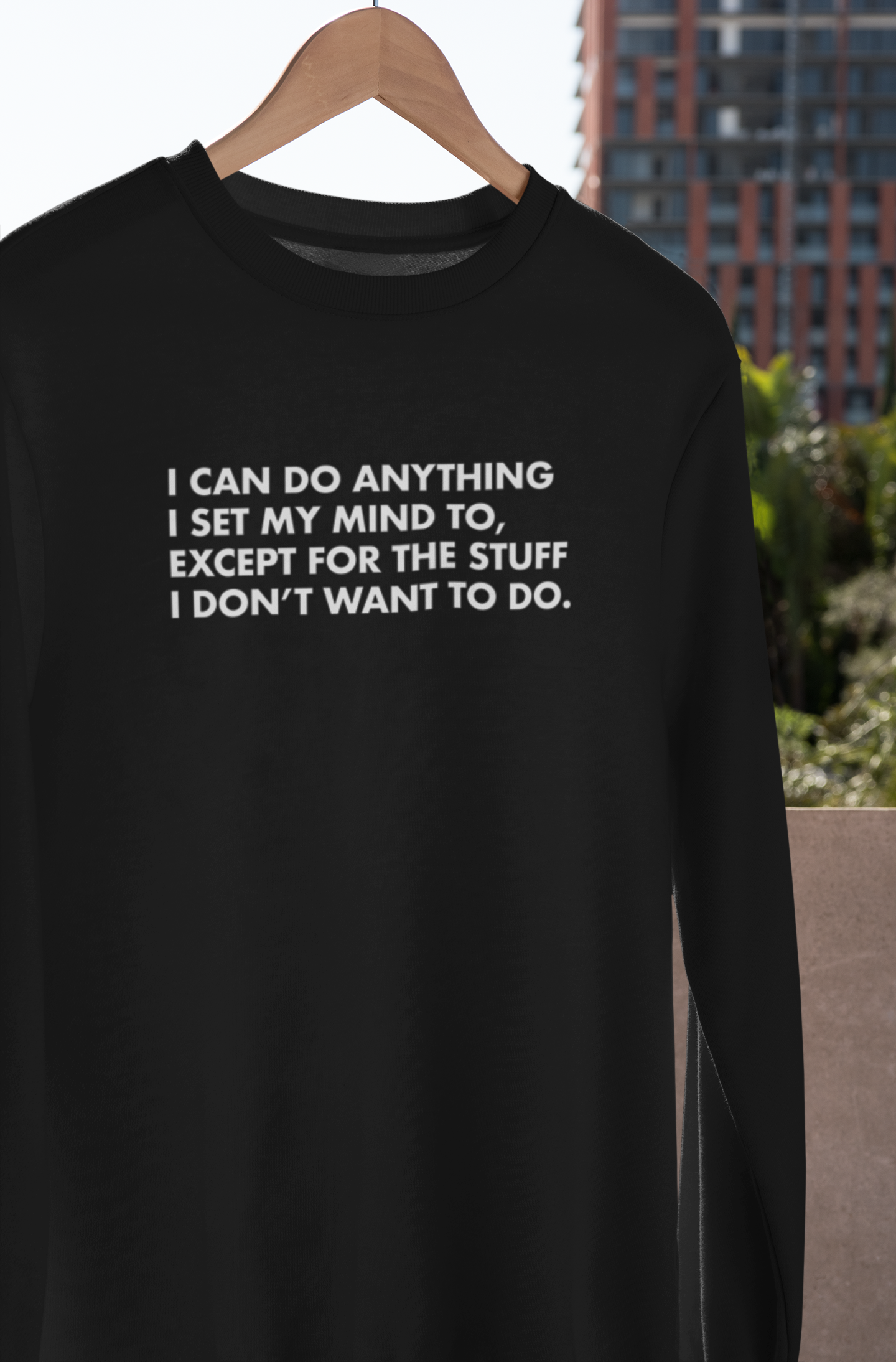 mockup-of-a-crewneck-sweatshirt-hanging-in-a-balcony-33978.png
