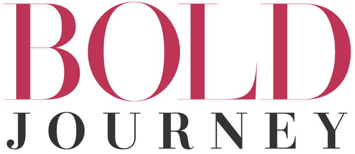 Close-up of text reading 'BOLD JOURNEY' with 'BOLD' in large red letters and 'JOURNEY' in smaller black letters underneath, the logo for Bold Journey magazine.
