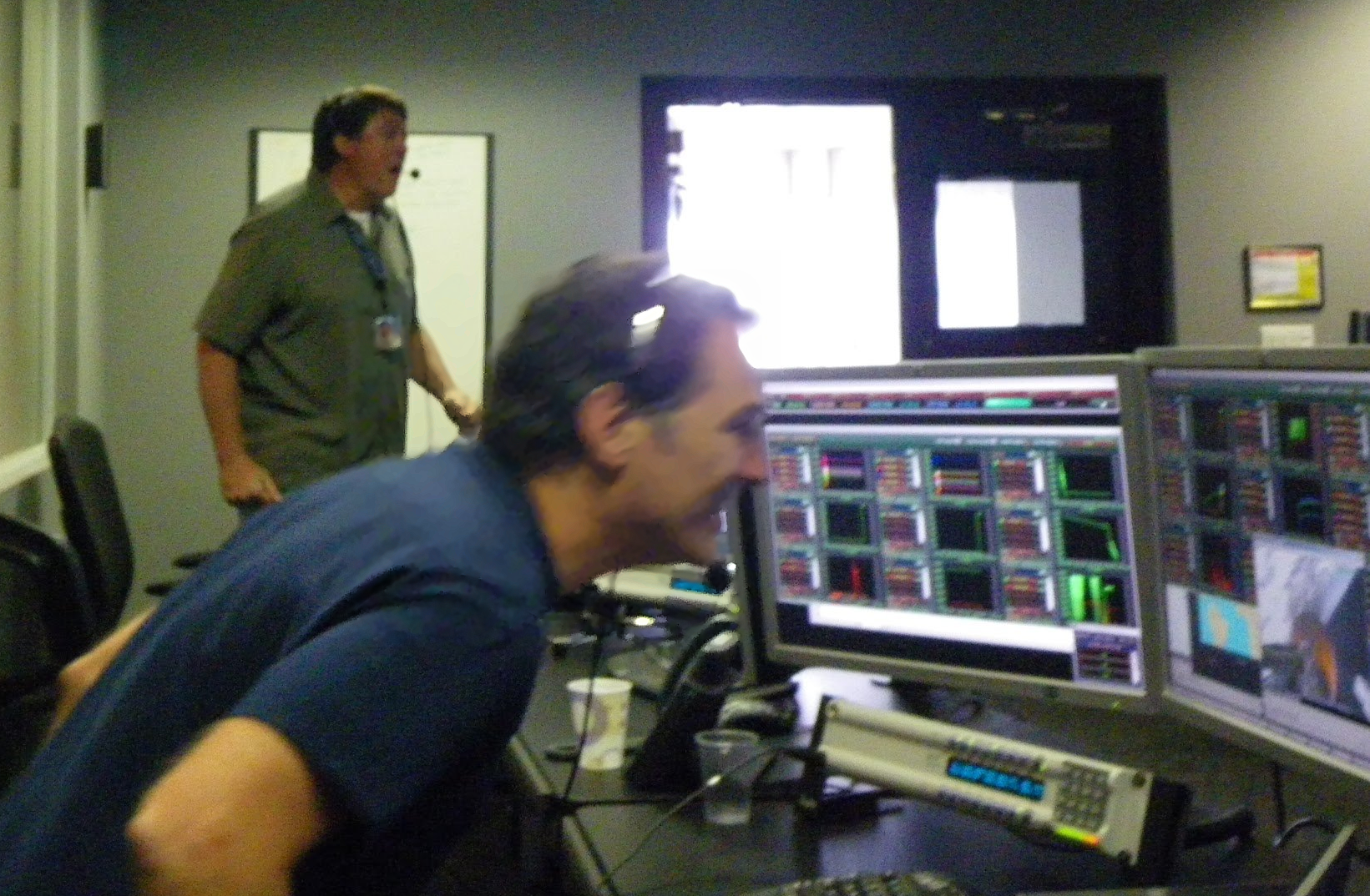 Tom Mueller watching the screen on the first Falcon 9 launch