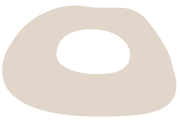 A cartoon illustration of a beige potato with a black hole in the center.